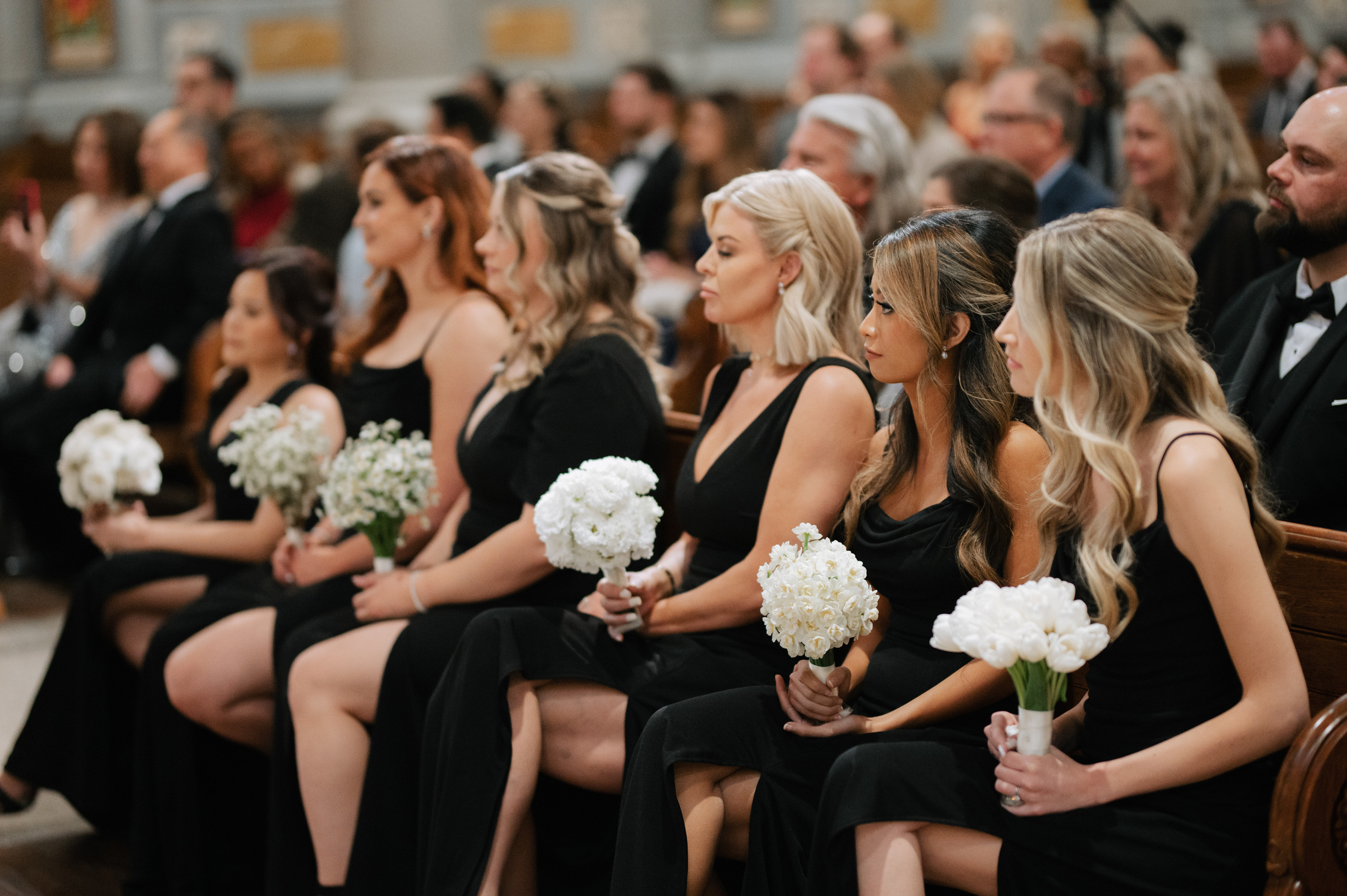 a group of people sitting down in a church