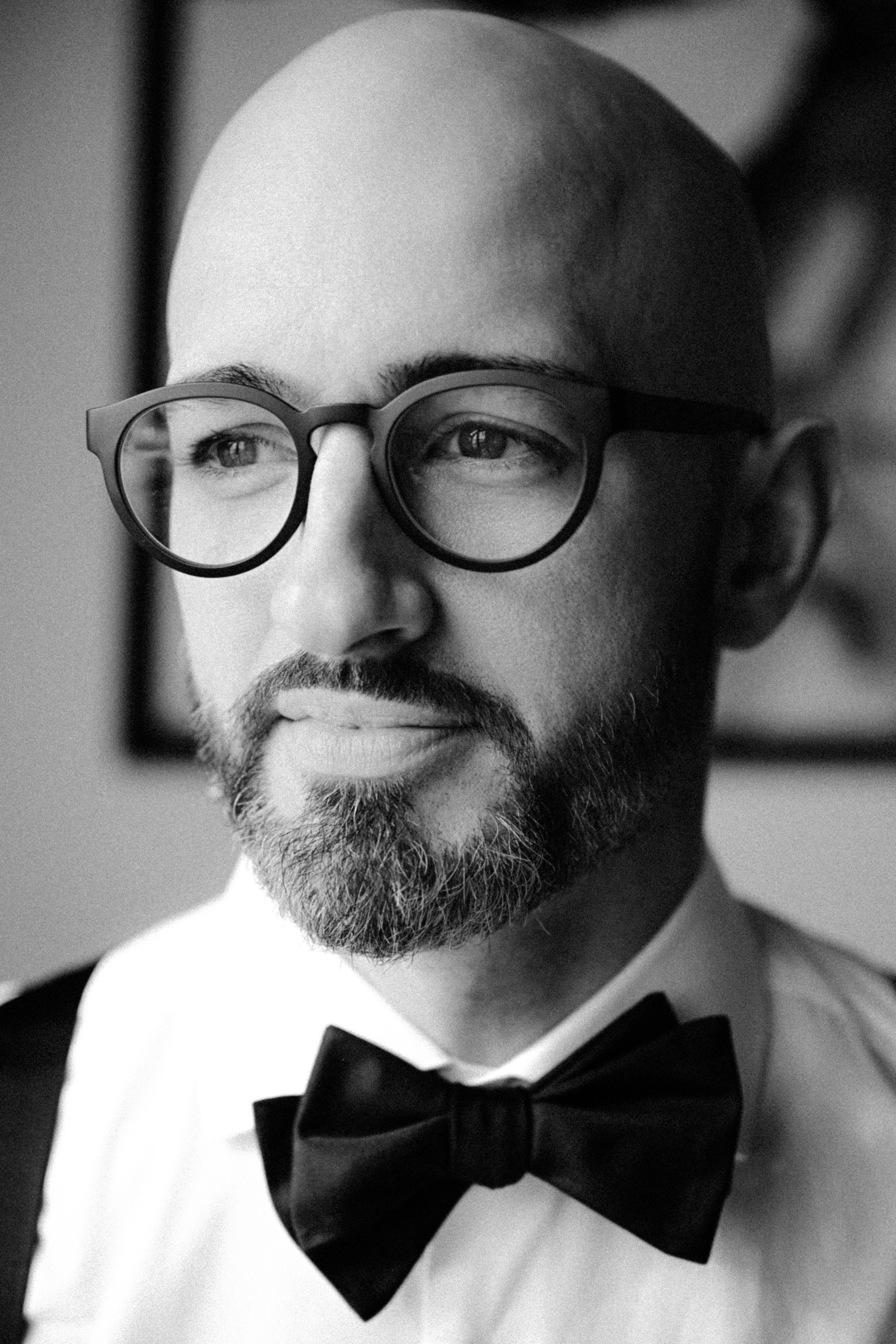 a man with a beard and glasses