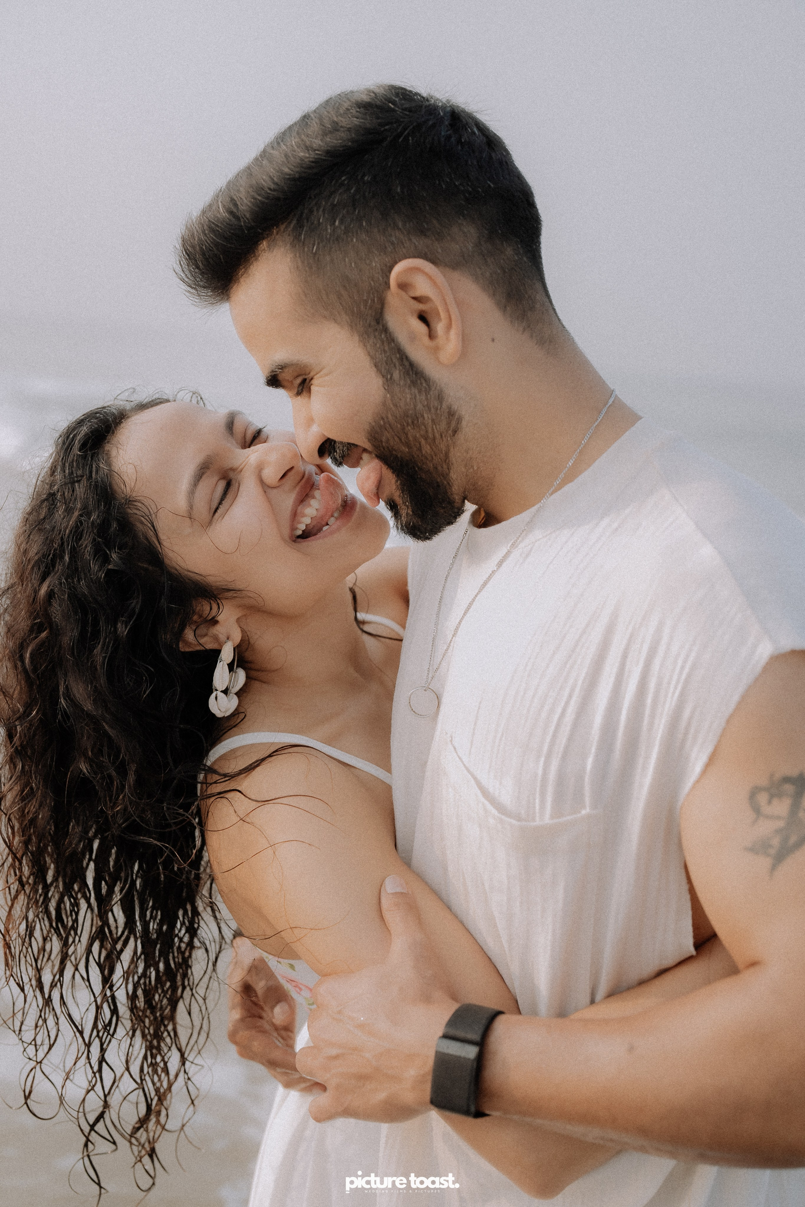 Love In The Beach. Fine art Wedding Photographers in India & Canada