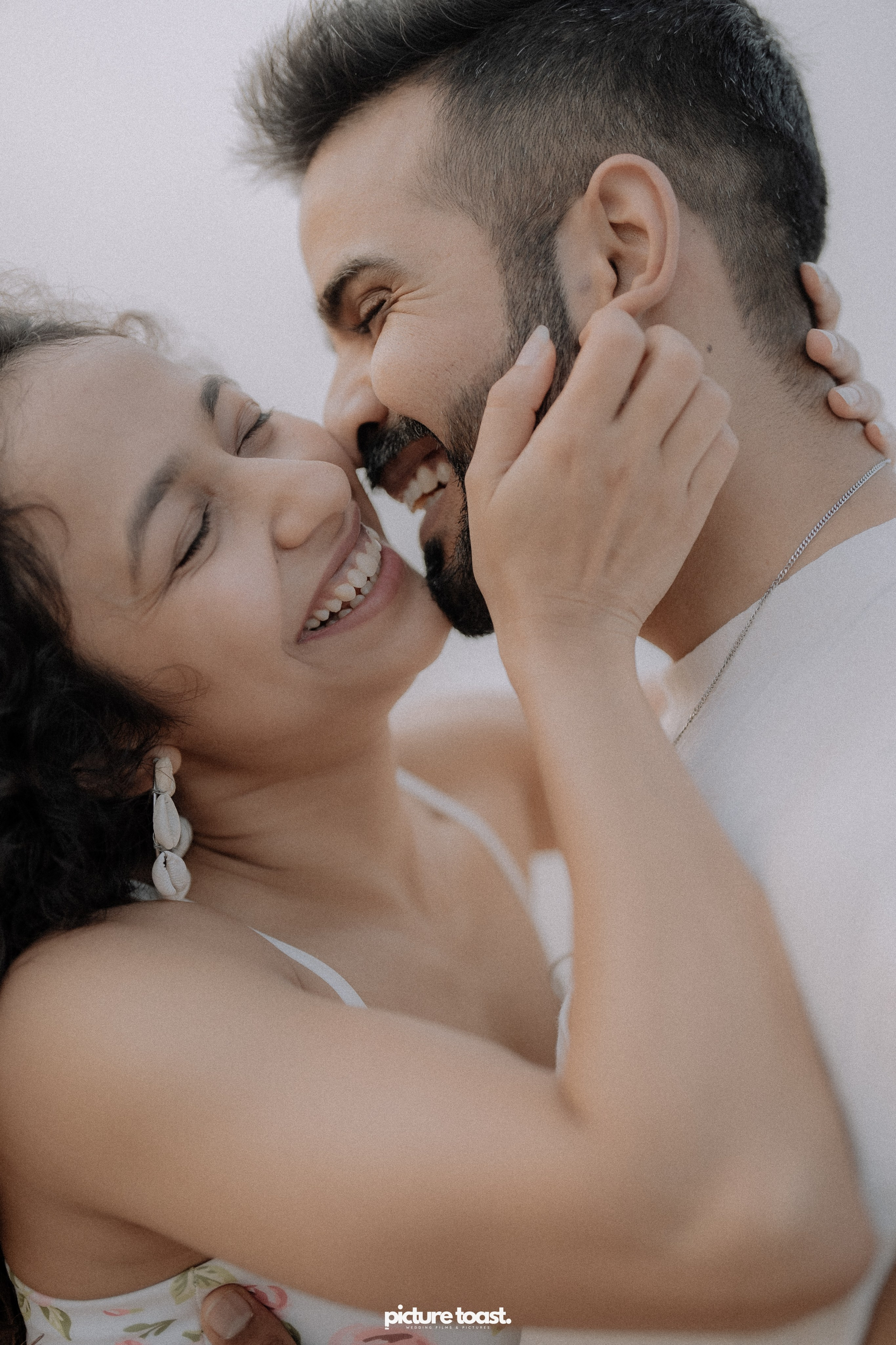 Love In The Beach. Fine art Wedding Photographers in India & Canada