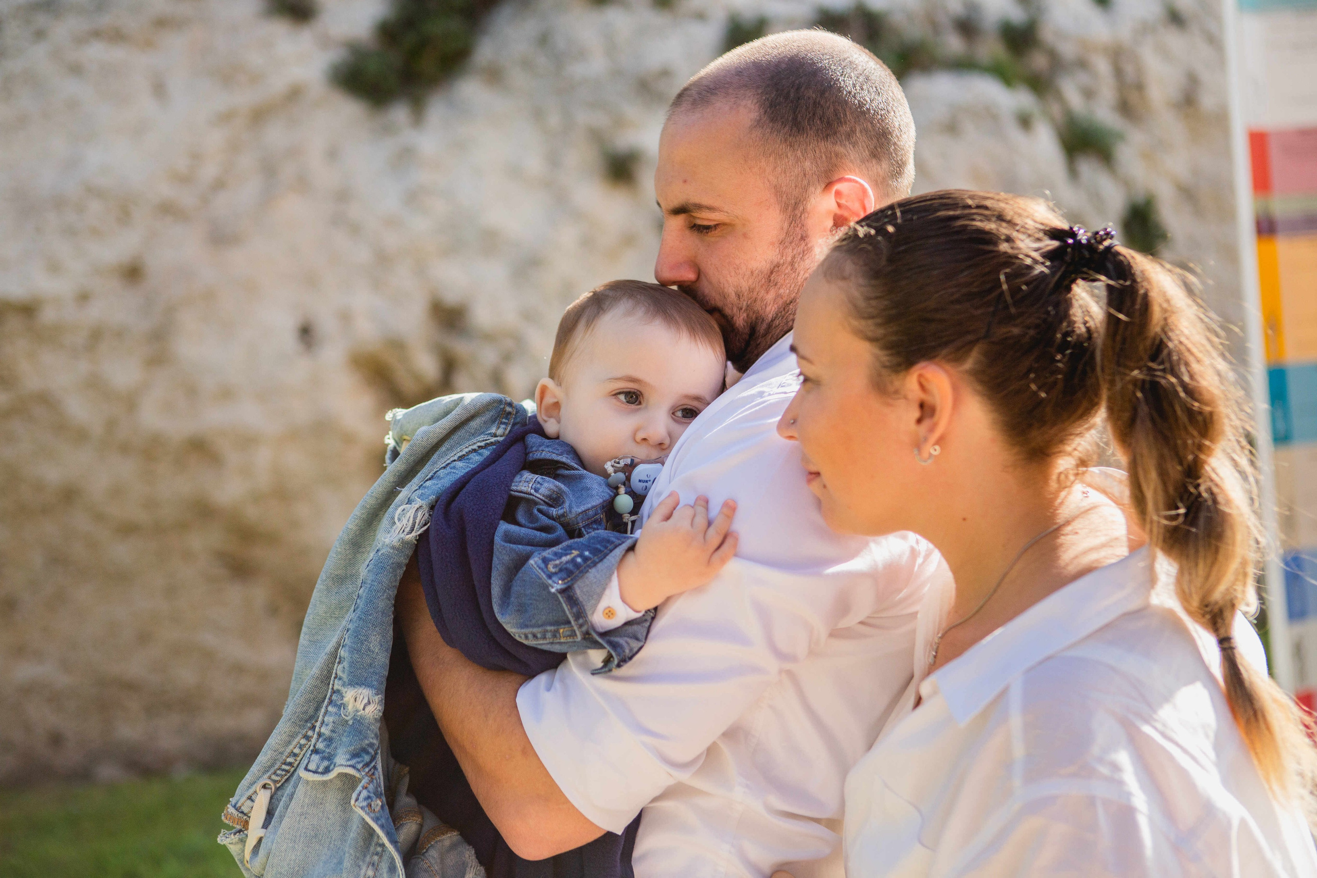 AT THE WALLS OF THE OLD CITY. PHOTOGRAPHER IN ISRAEL