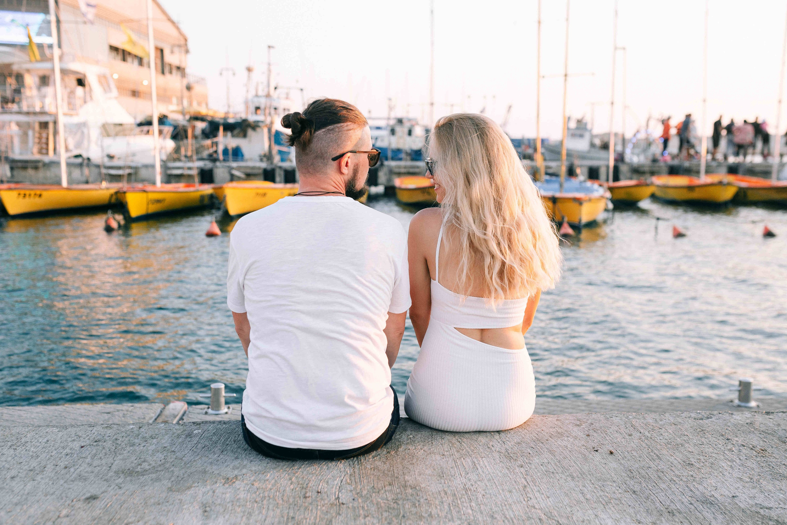 SUNSET IN JAFFO PORT. PHOTOGRAPHER IN ISRAEL