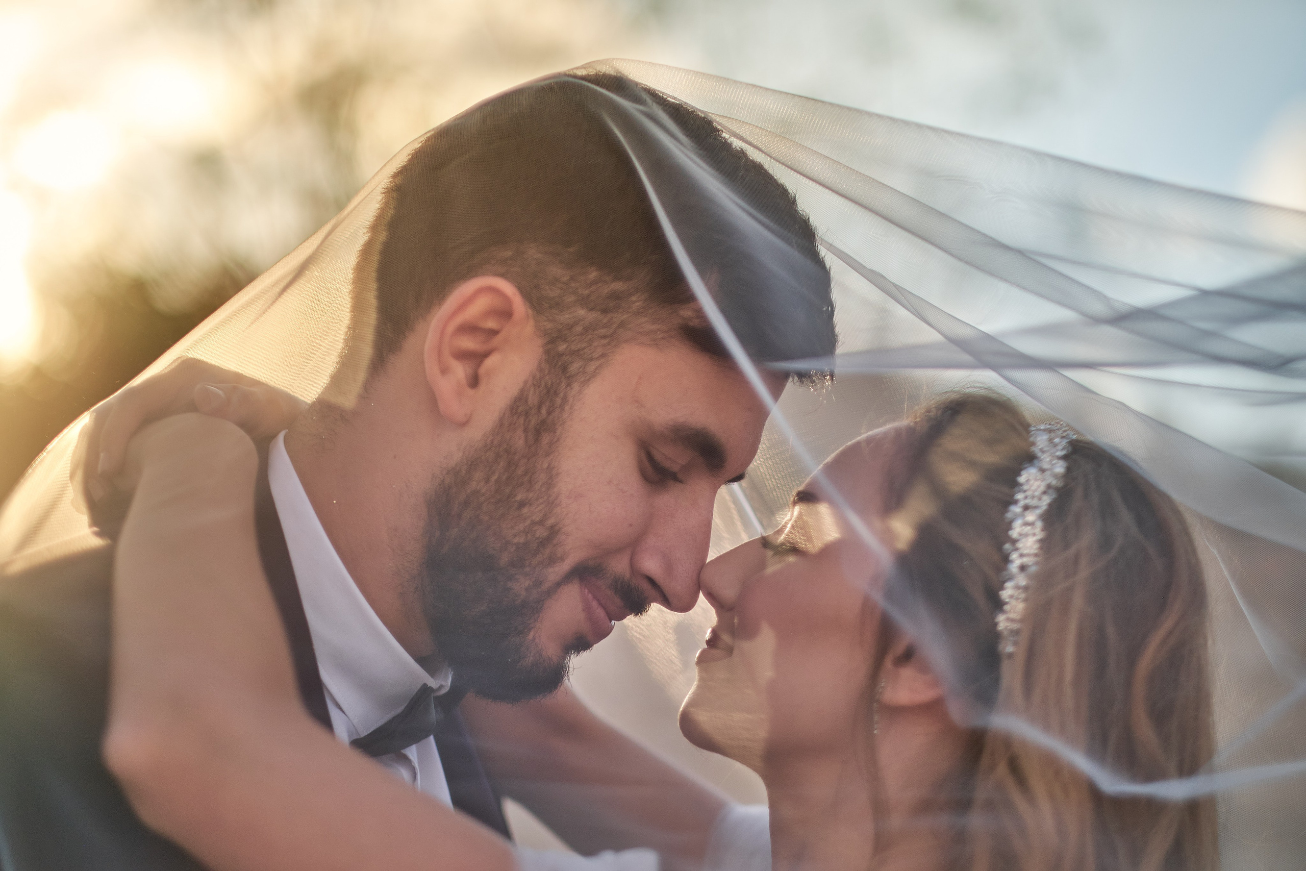 Love Story , wedding Romantic wedding couple portrait, bride with veil and groom in suit, emotional wedding photography by Maxim Polak Israel