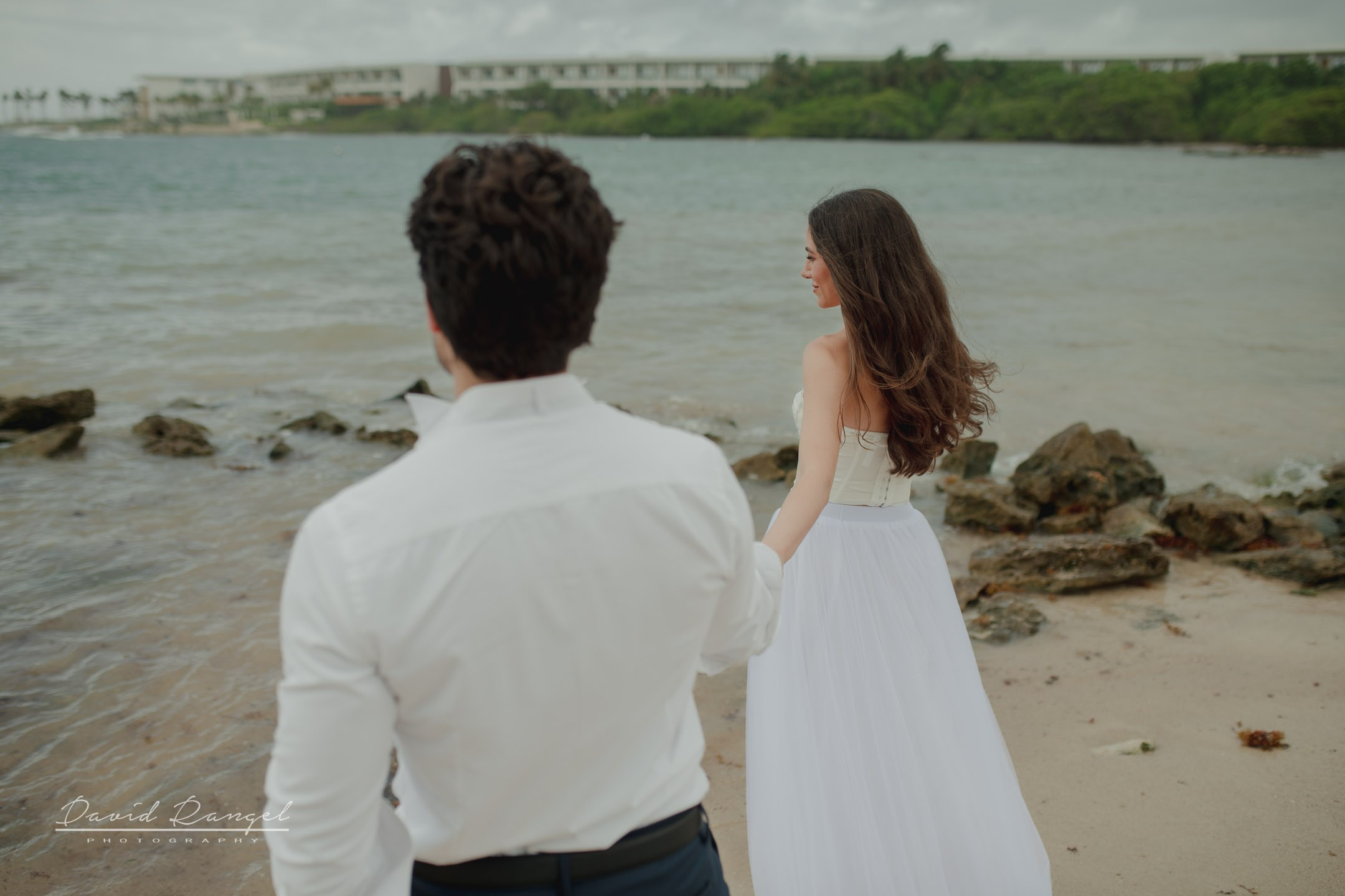 Secilia and Brandon tras the dress at the Conrad Tulum Hotel. Destination wedding photographer based in Cancun and Riviera Maya with service worldwide