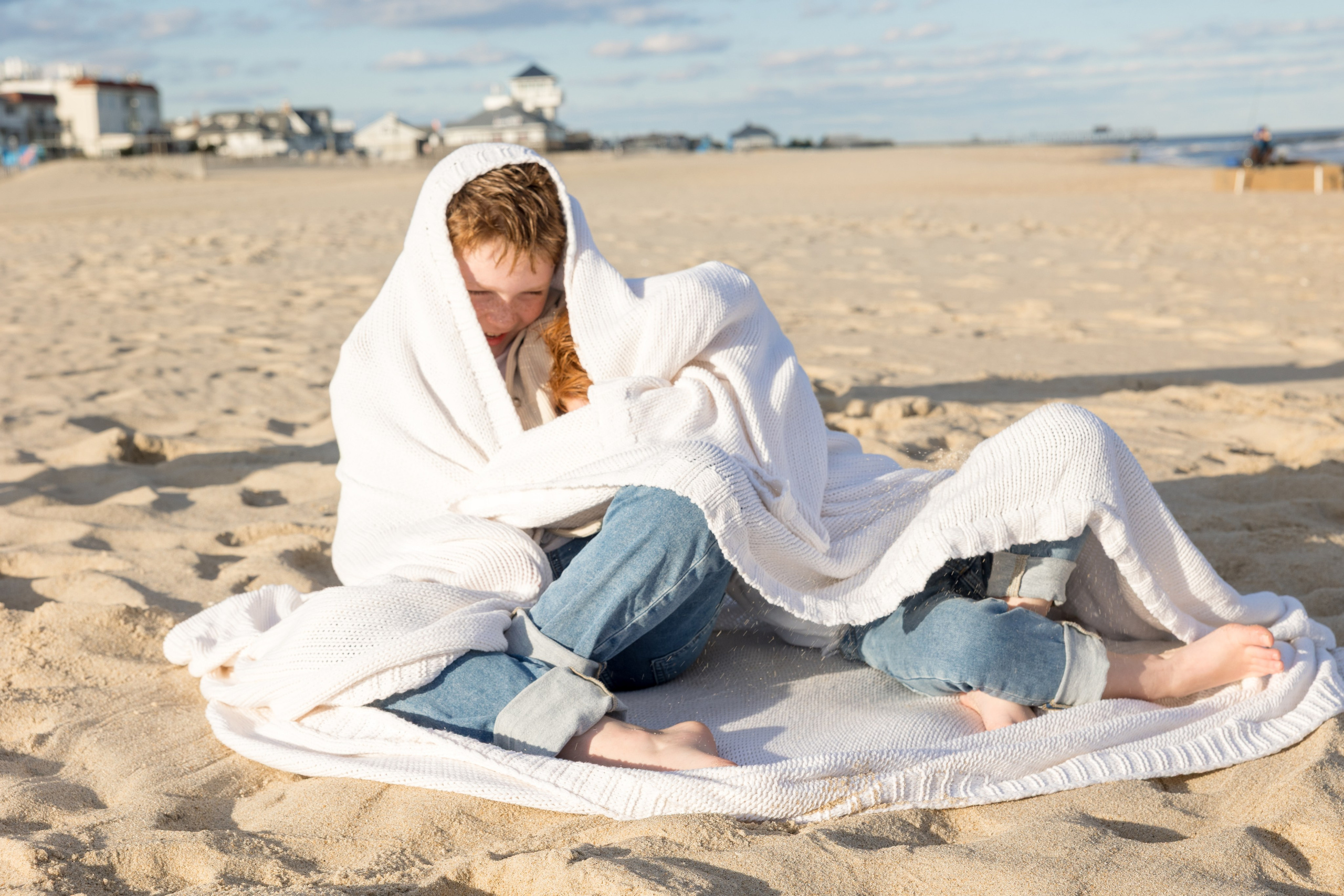 Sun, Sand, and Family Hugs. Family, lifestyle, and commercial photography in New York and New Jersey