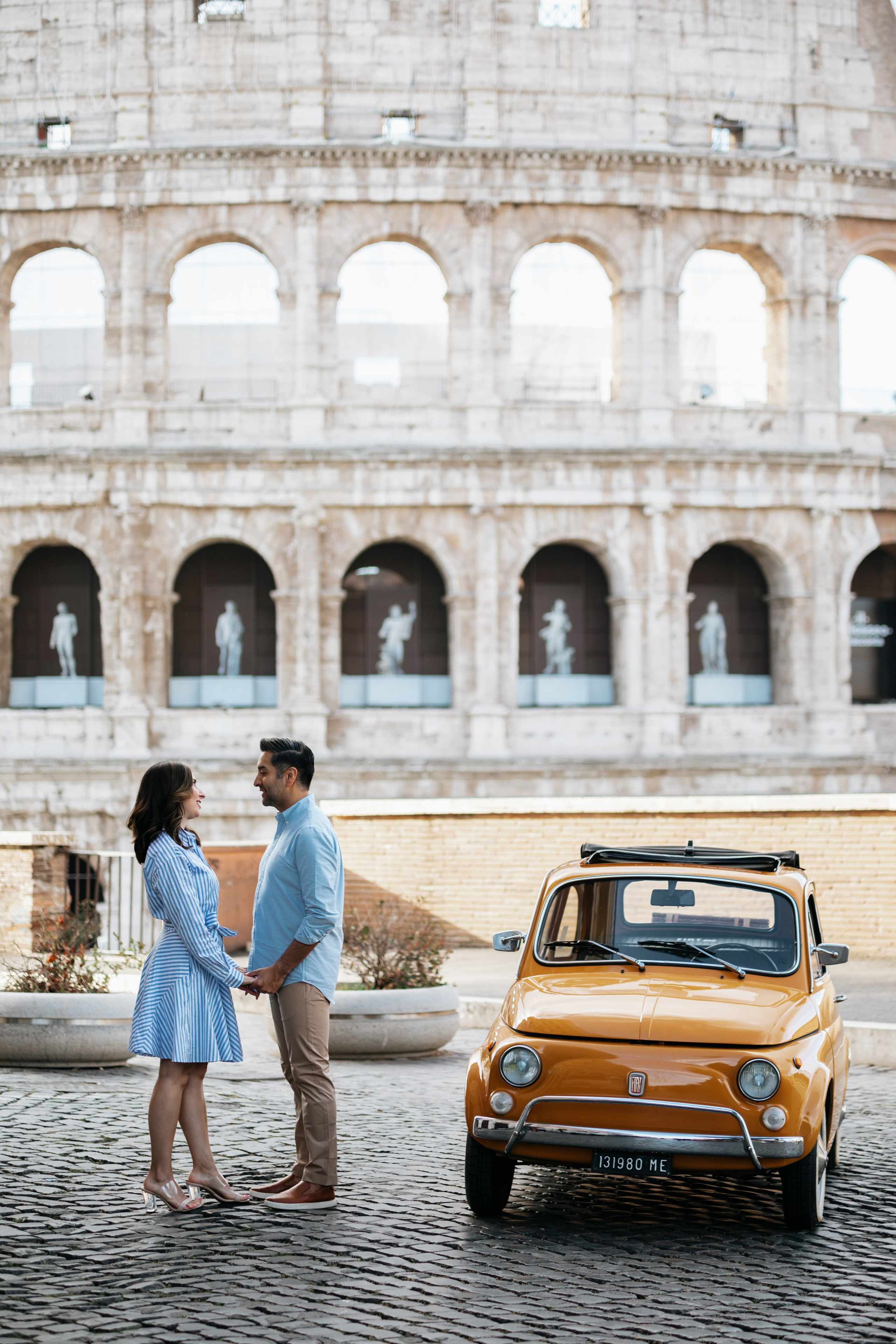 Fiat 500 and Vespa. Photographer in Rome