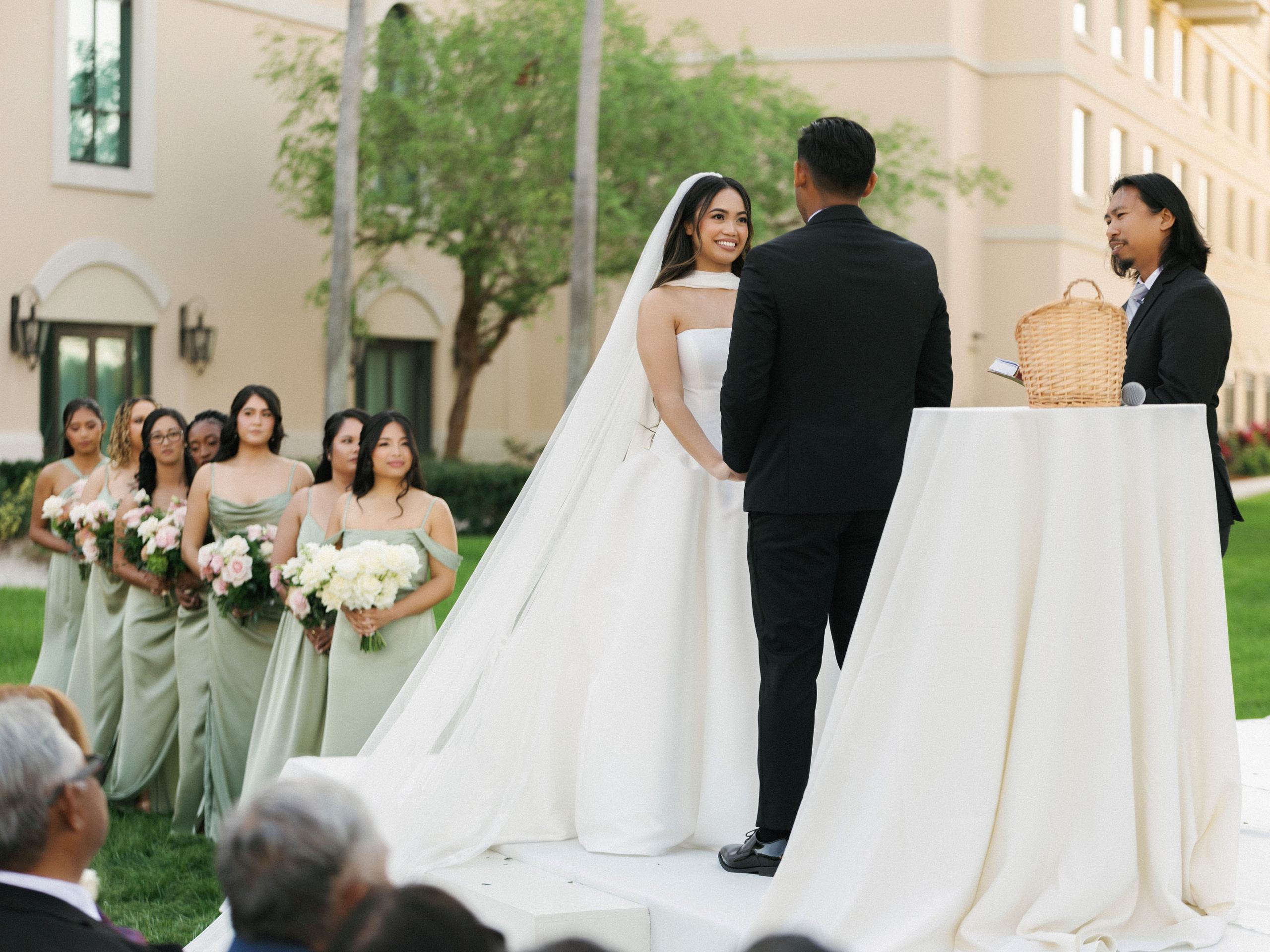 Bride and groom standing together at the wedding altar