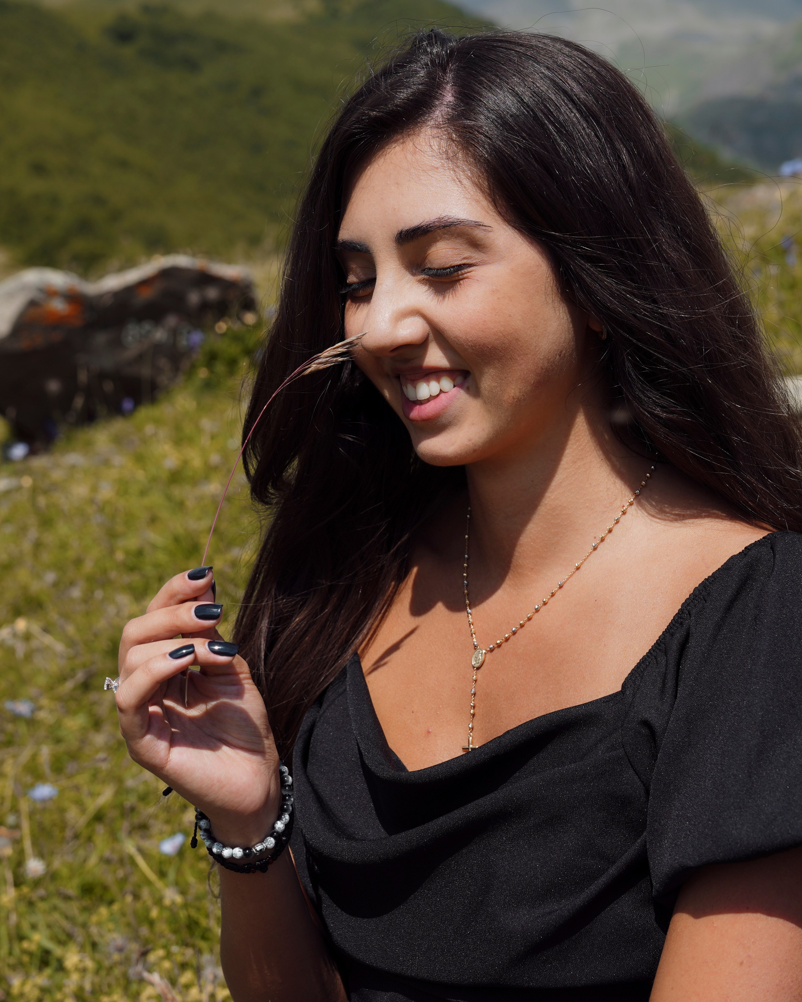 Portrait of woman in mountains with soft natural light in Kazbegi