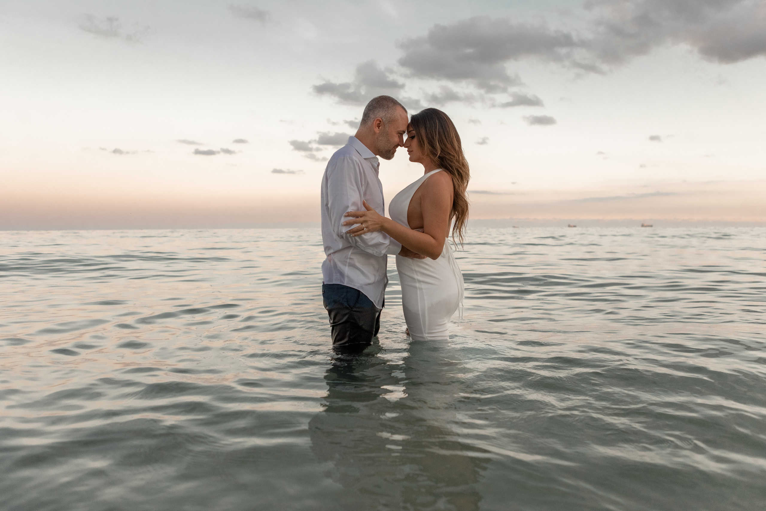Sunset on the beach. My name is Kate and I am family and wedding photographer