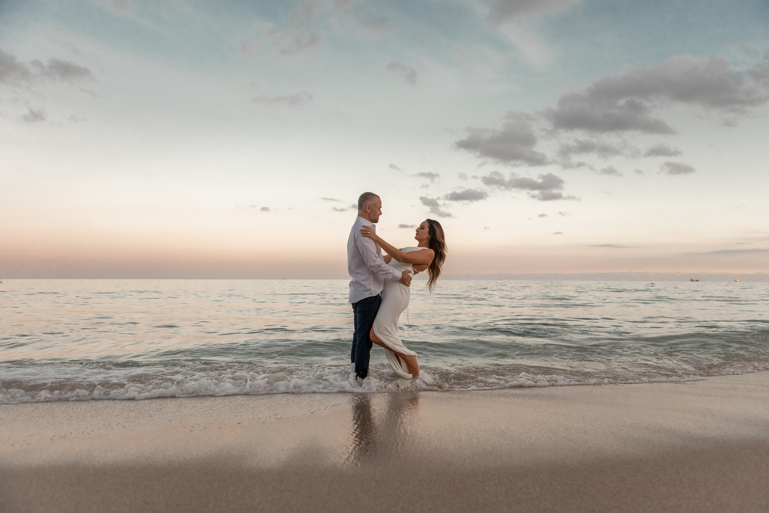 Sunset on the beach. My name is Kate and I am family and wedding photographer