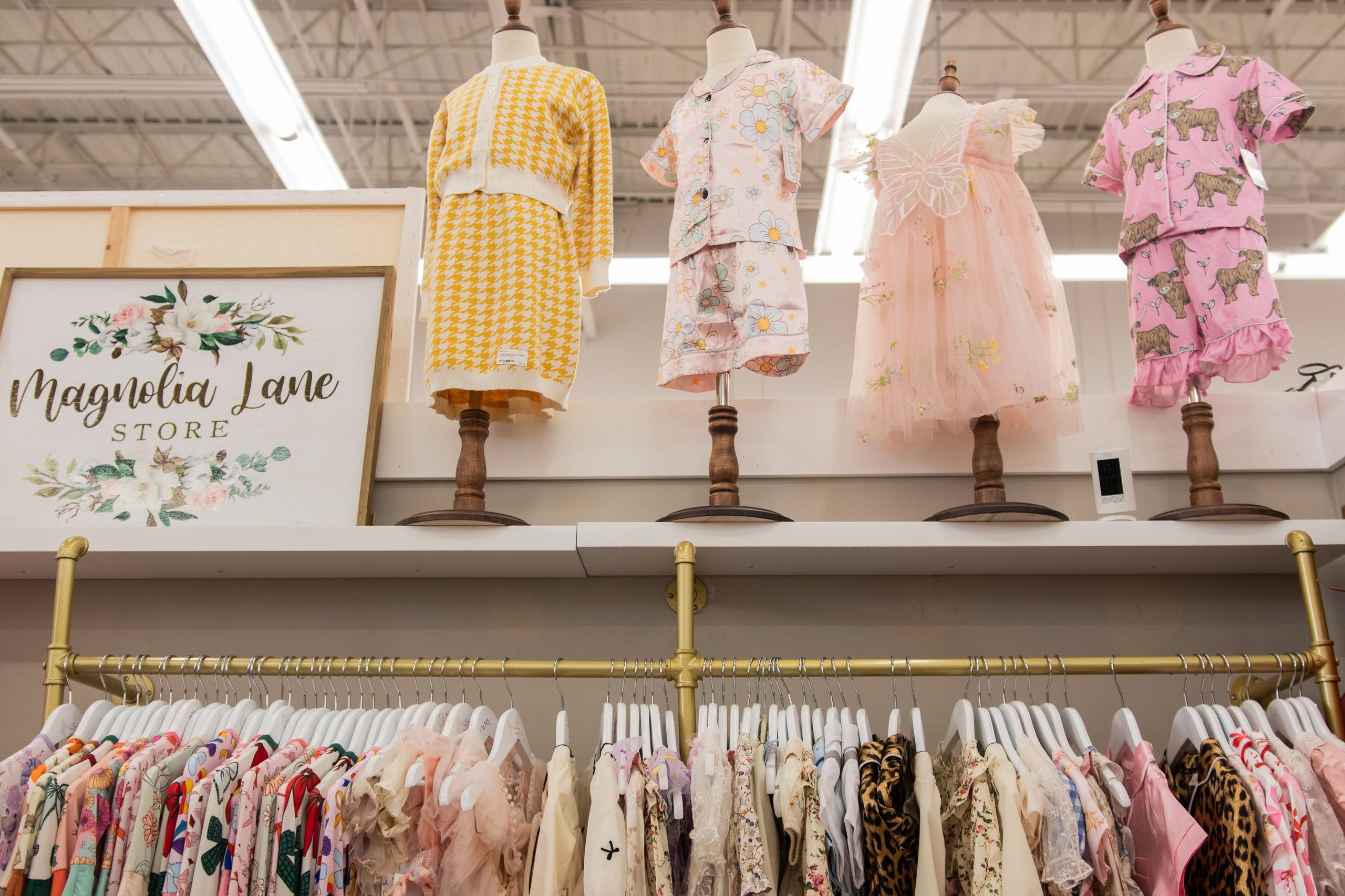 Painted Tree Boutiques fall collection retail photoshoot in Round Rock