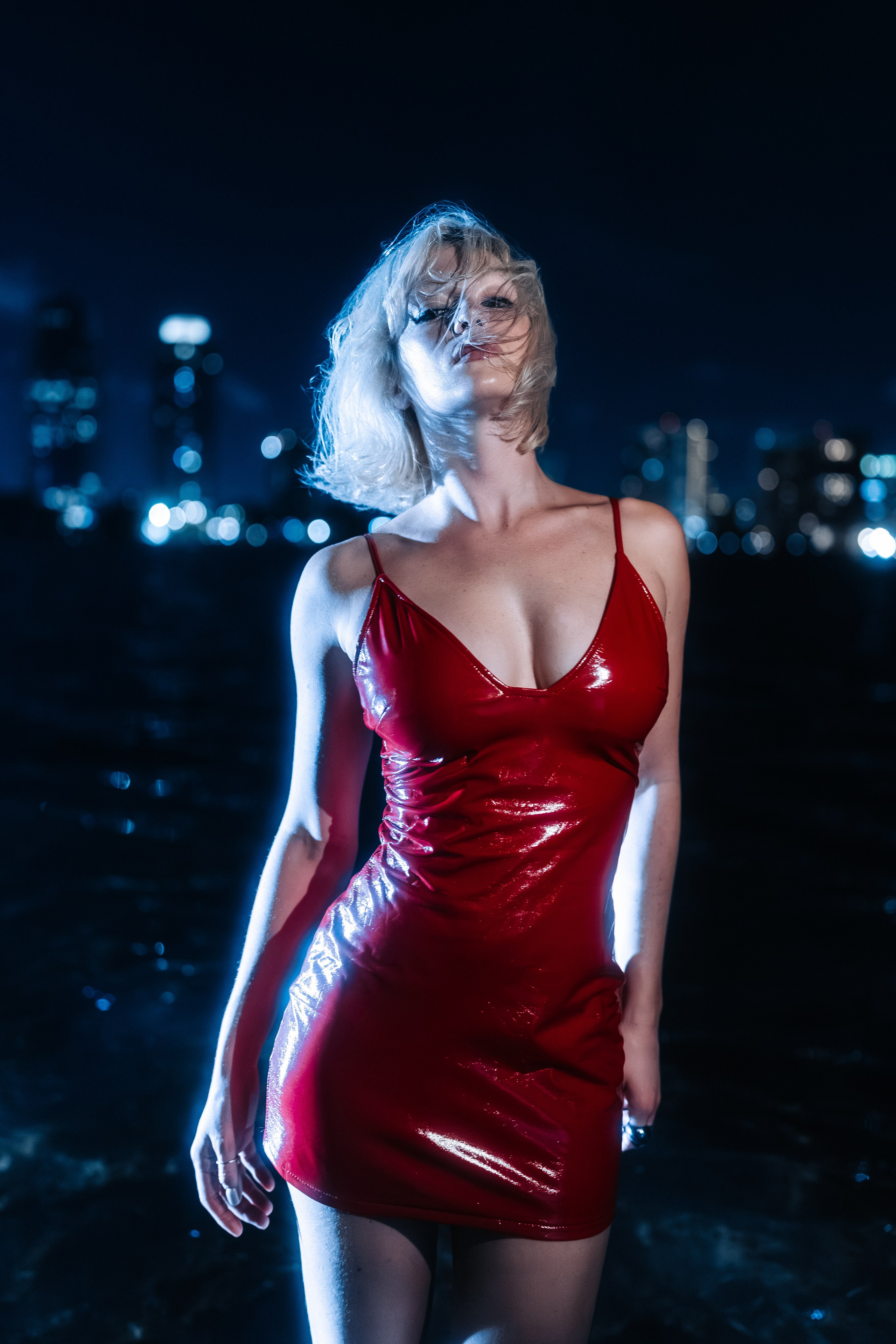 Night portrait with controlled lighting and soft expression. Suitable for fashion publications and creative projects.