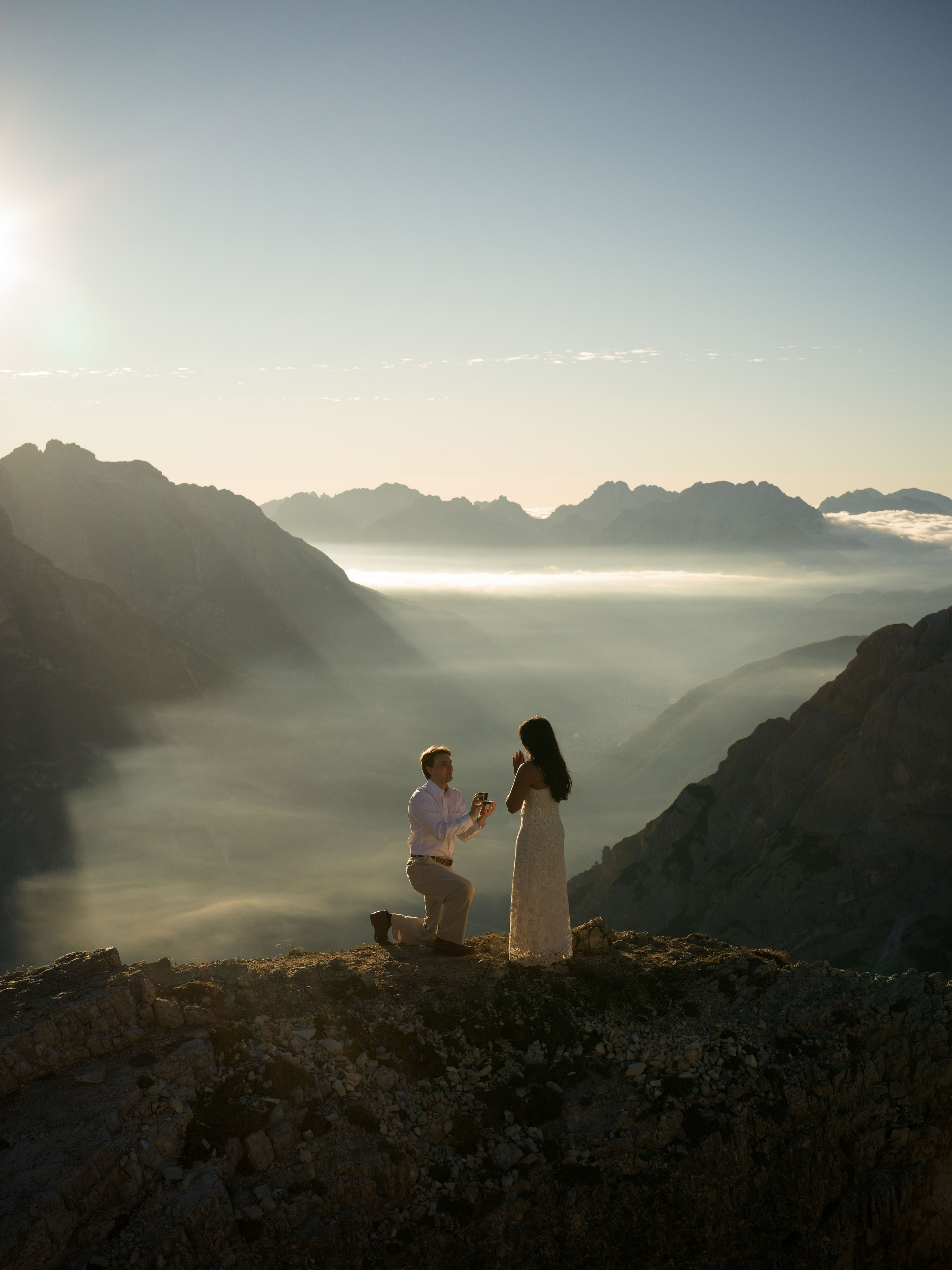 Intimate Dolomites elopement and surprise proposal at Cadini di Misurina, capturing a cinematic love story against the dramatic Tre Cime landscape.