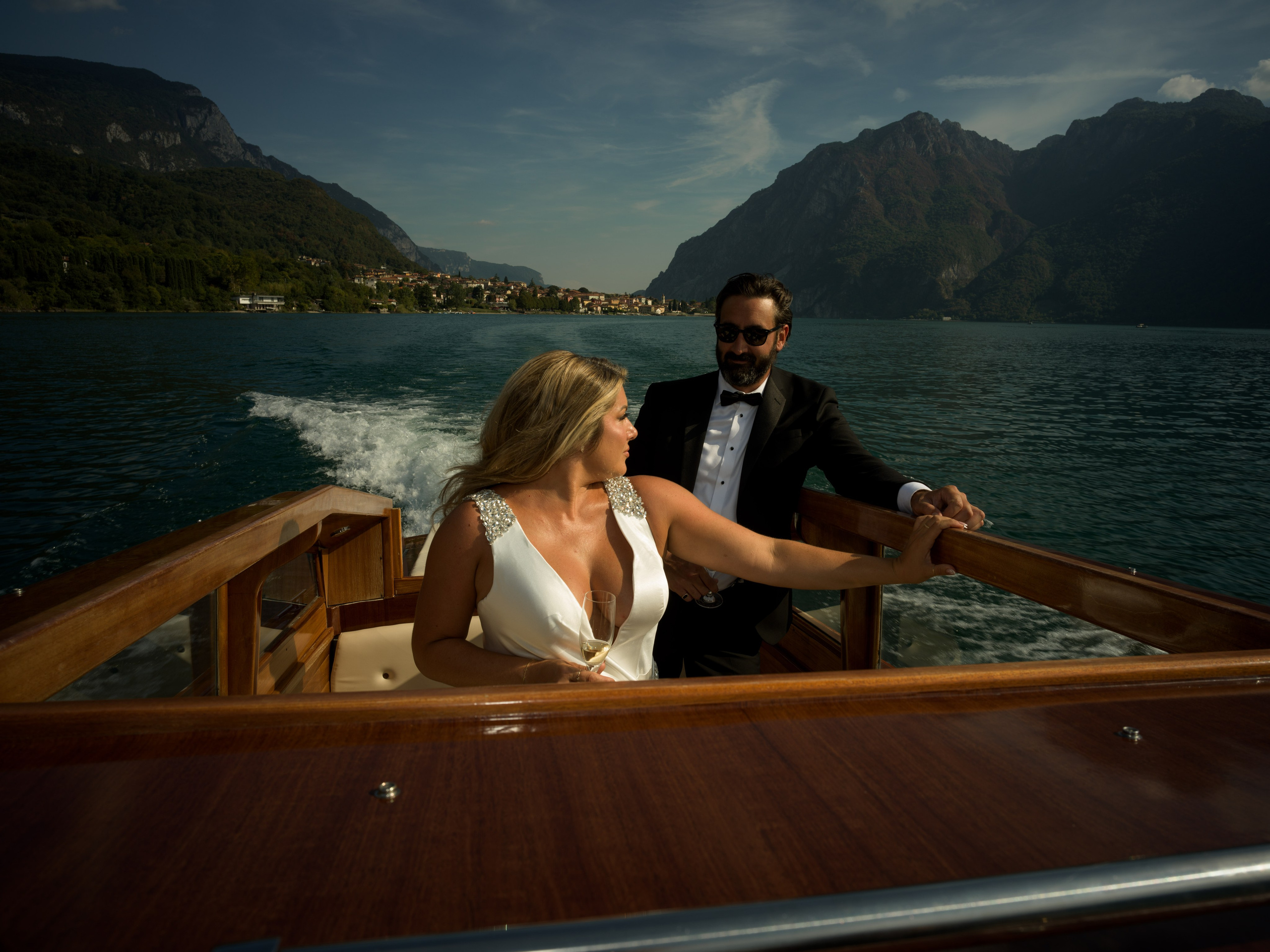 Lecco Lake Como wedding elopement with a couple photographed on a traditional Italian boat