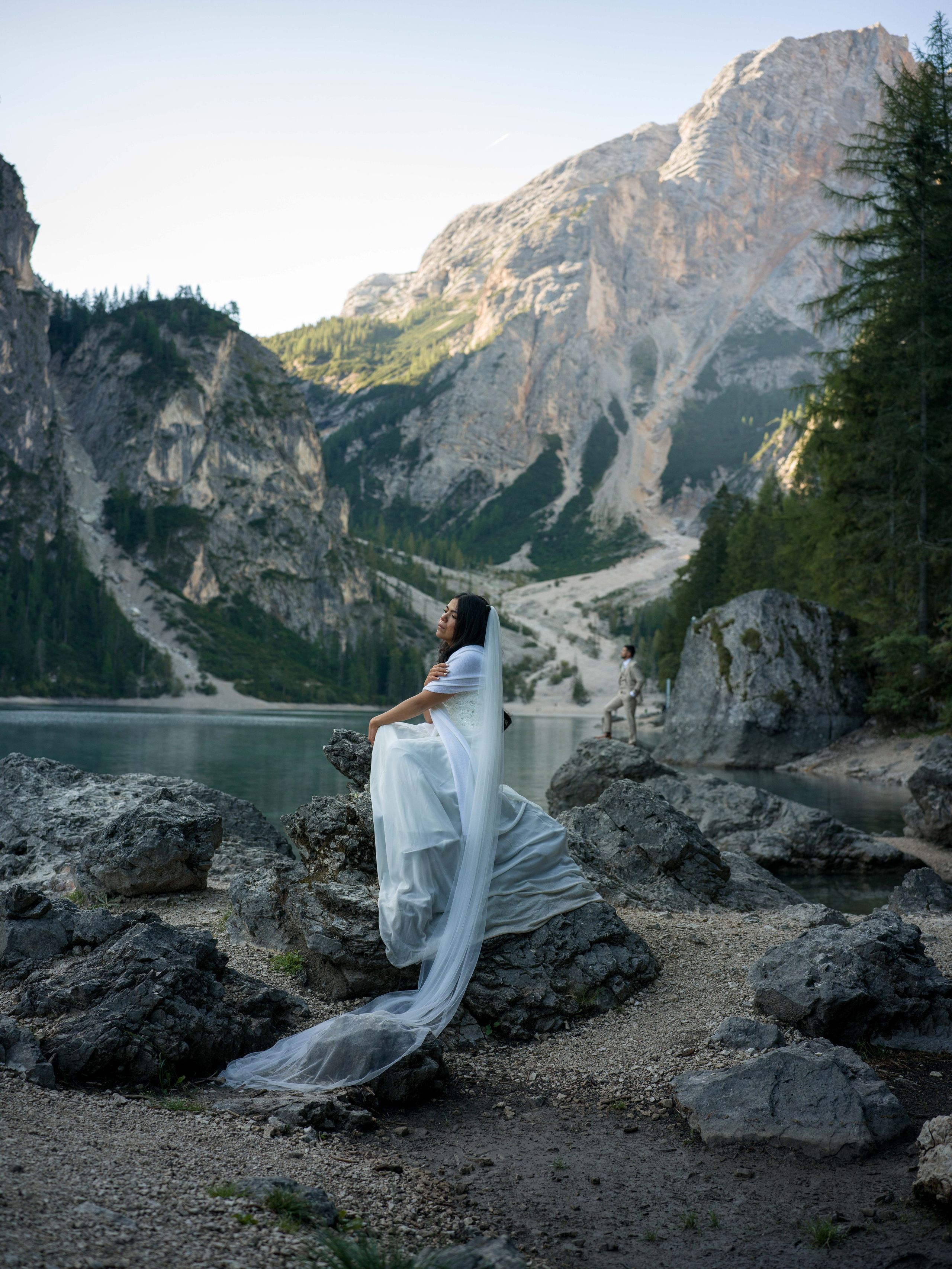 Intimate Lake Braies elopement in the Dolomites captured through cinematic photography and video on the lake and in nature