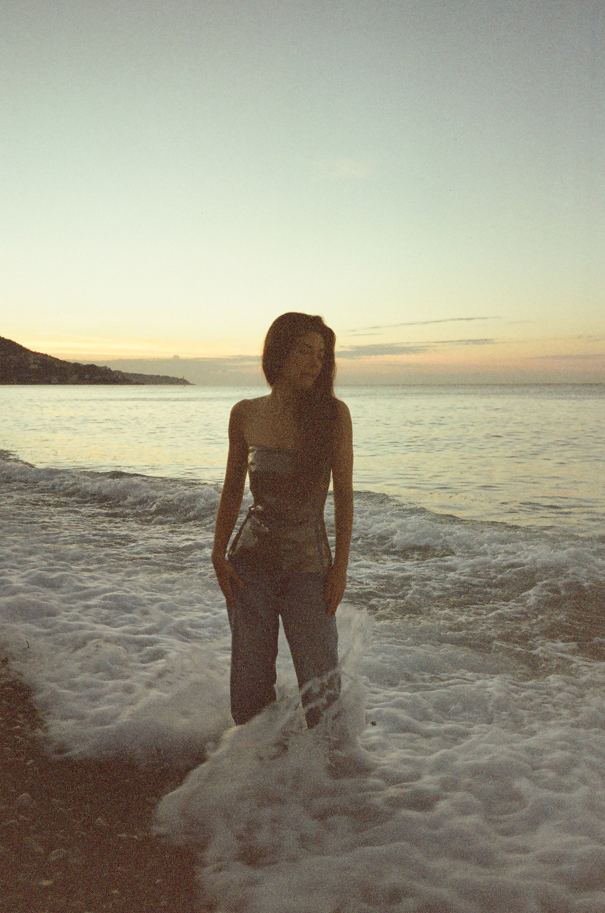 Fine art film photo, Nice, France – mermaid-inspired editorial portrait in a Rick Owens corset by the sea at dawn