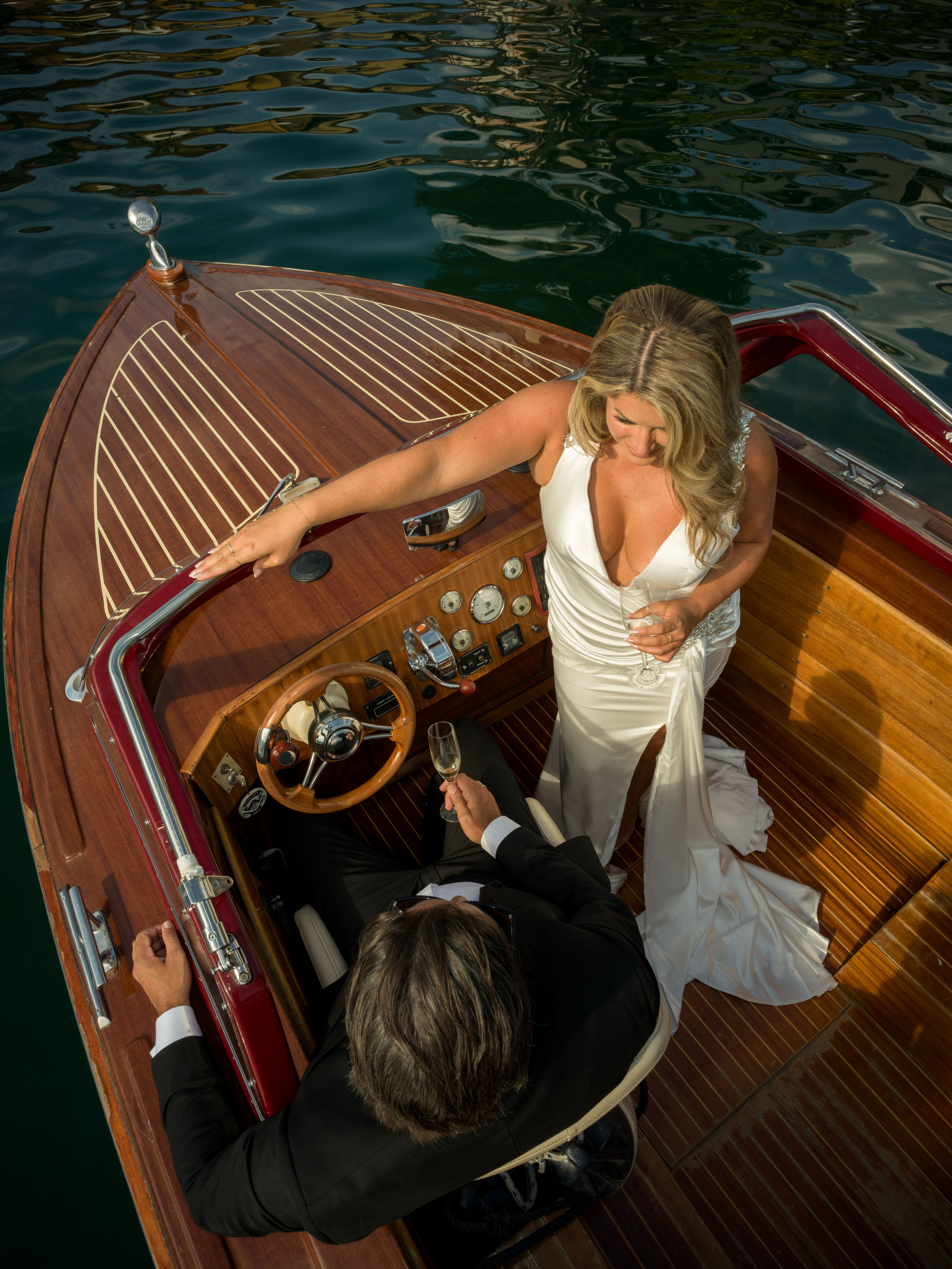 Cinematic Lecco Lake Como elopement with romantic couple portraits on a boat