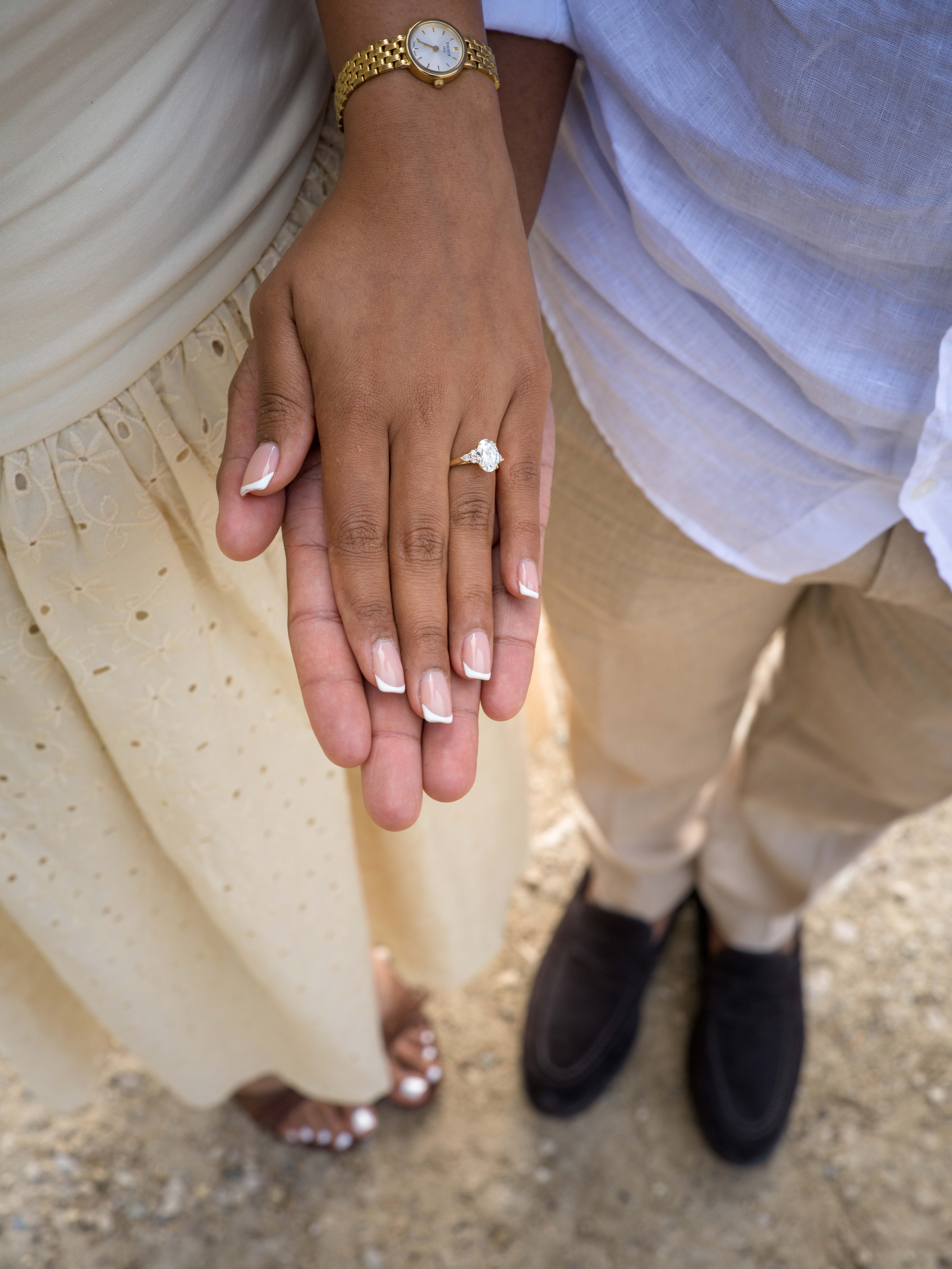 Surprise proposal captured at Lake Braies with dramatic Dolomite scenery