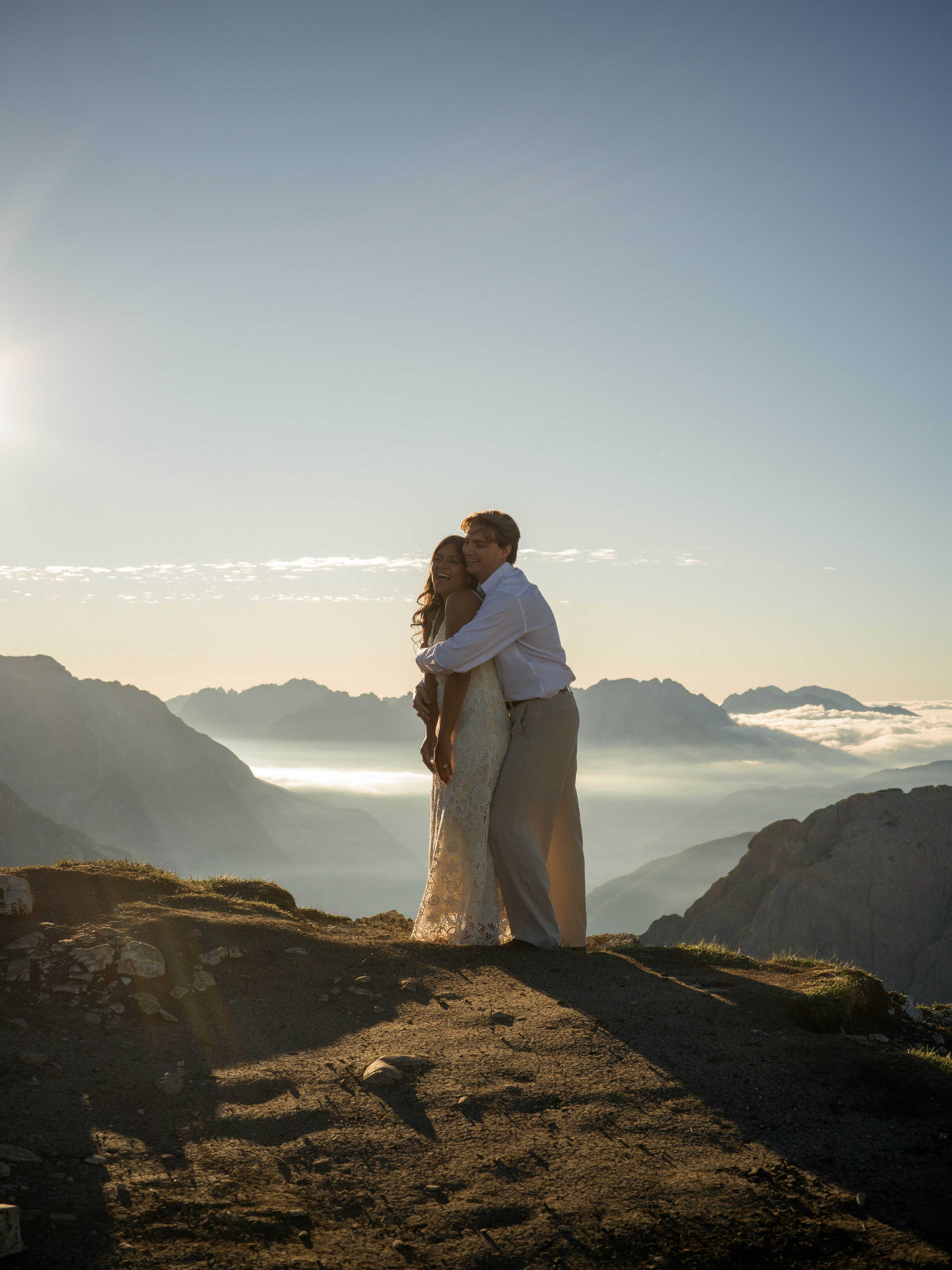 Professional Dolomites photographer capturing a romantic proposal and cinematic love story at Cadini Group, Misurina, near Tre Cime di Lavaredo, Italy.