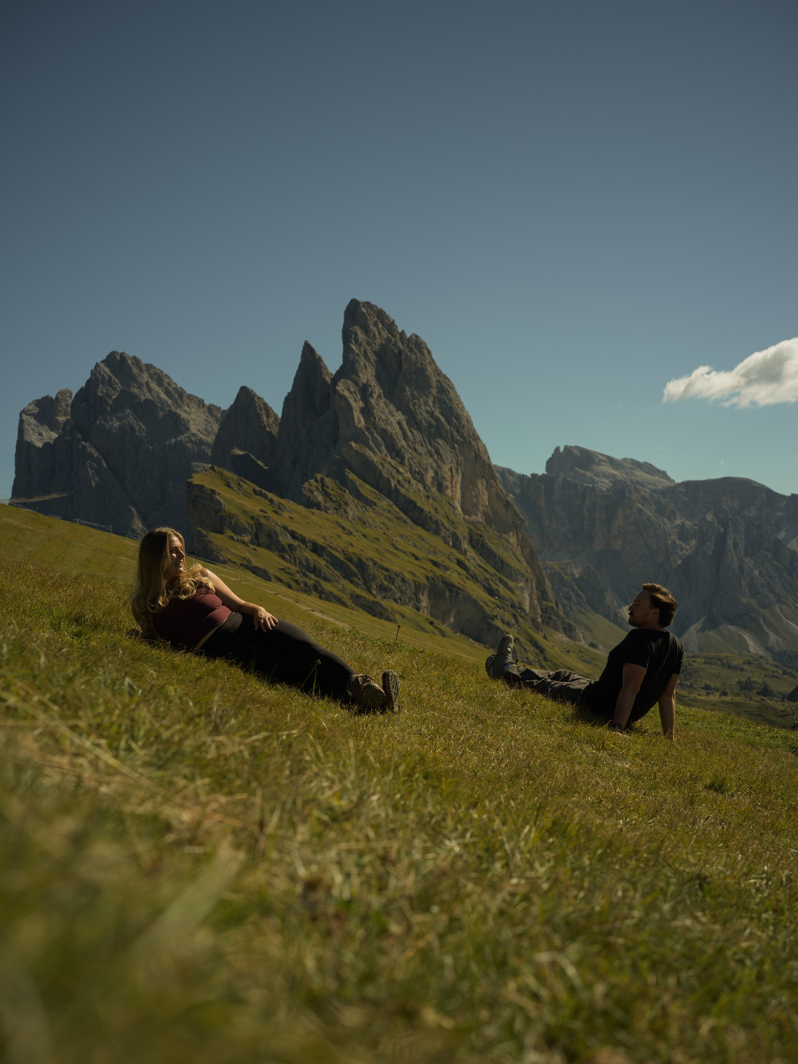 Professional proposal photography at Seceda Dolomites during sunrise, capturing an intimate engagement moment in the Italian Alps.