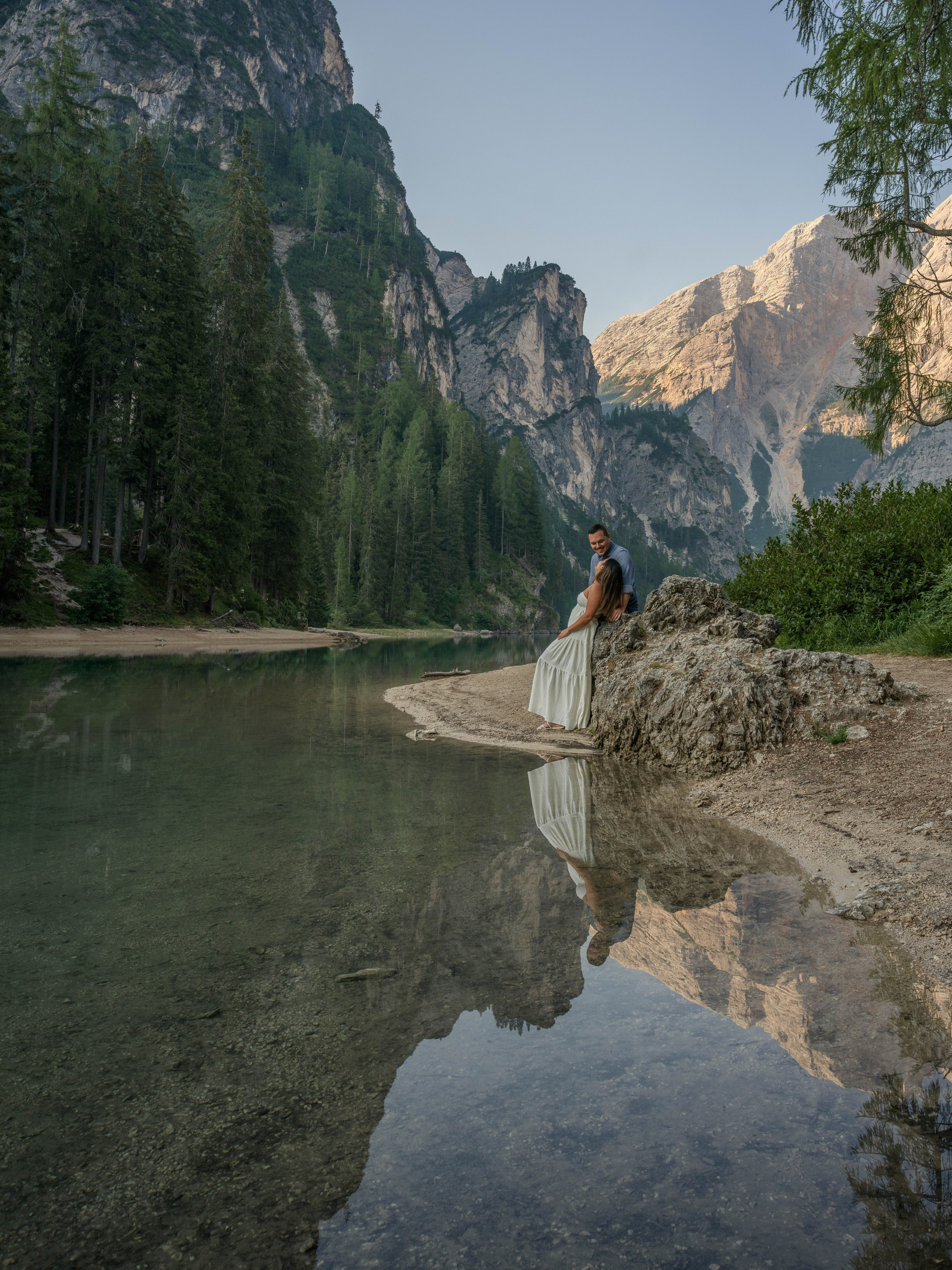 Romantic couple love story at Lake Braies in the Dolomites, Italy