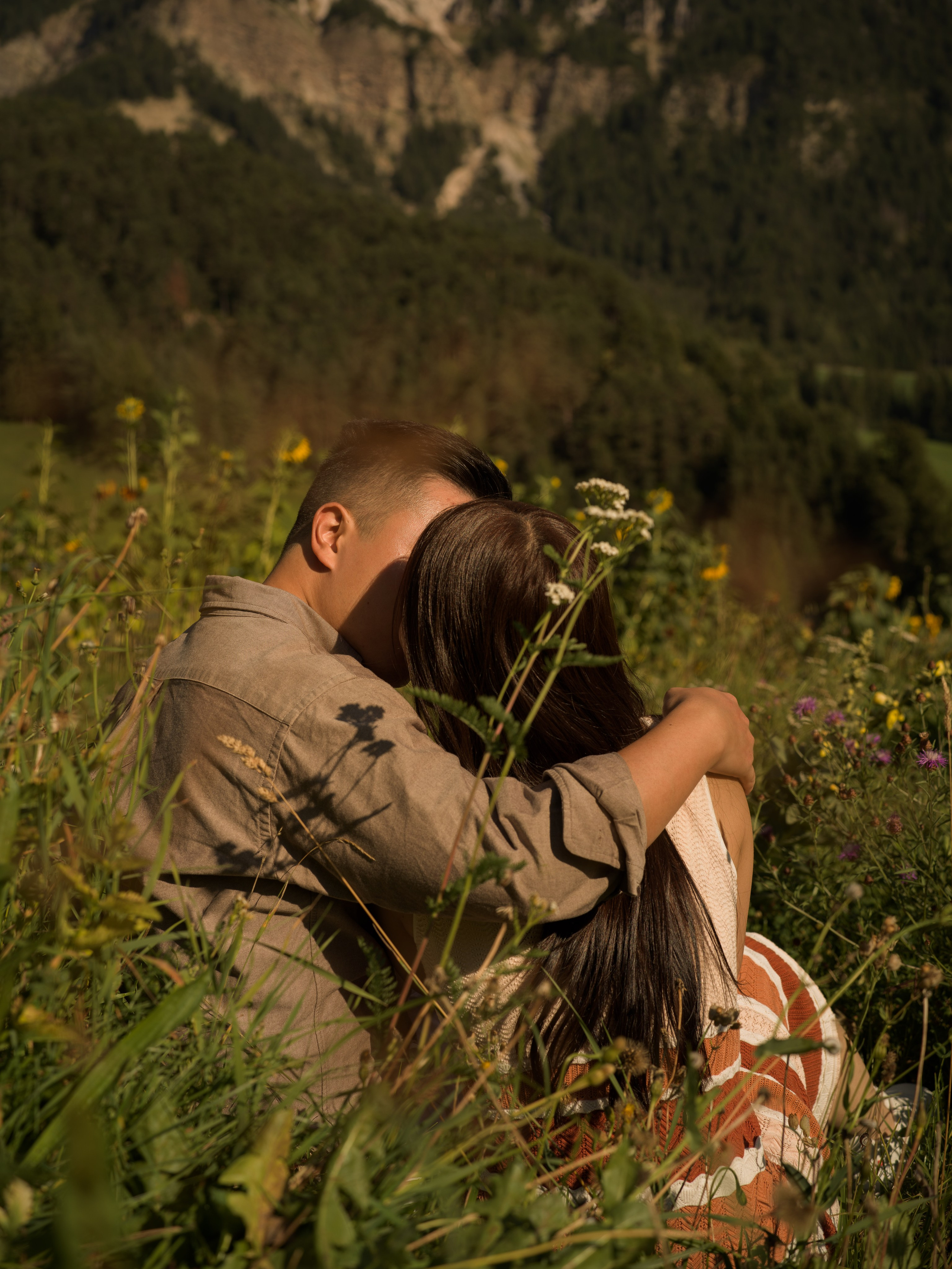 Intimate Dolomites engagement proposal at Santa Maddalena during sunset, scenic mountain landscape and romantic golden-hour light