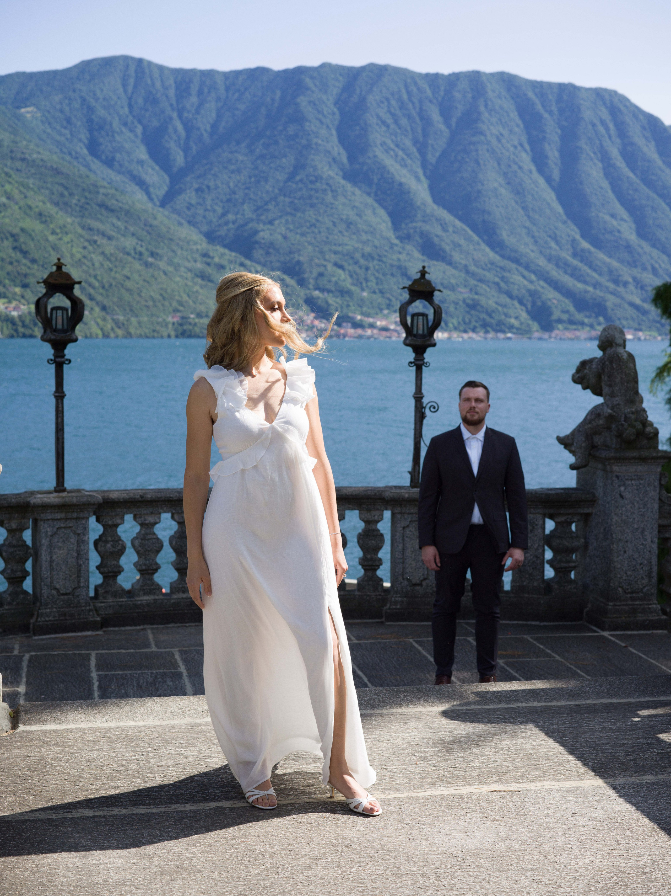 Elopement, Parco Civico Teresio Olivelli, Tremezzo, Lake Como – tree-lined alley with couple in light outfits