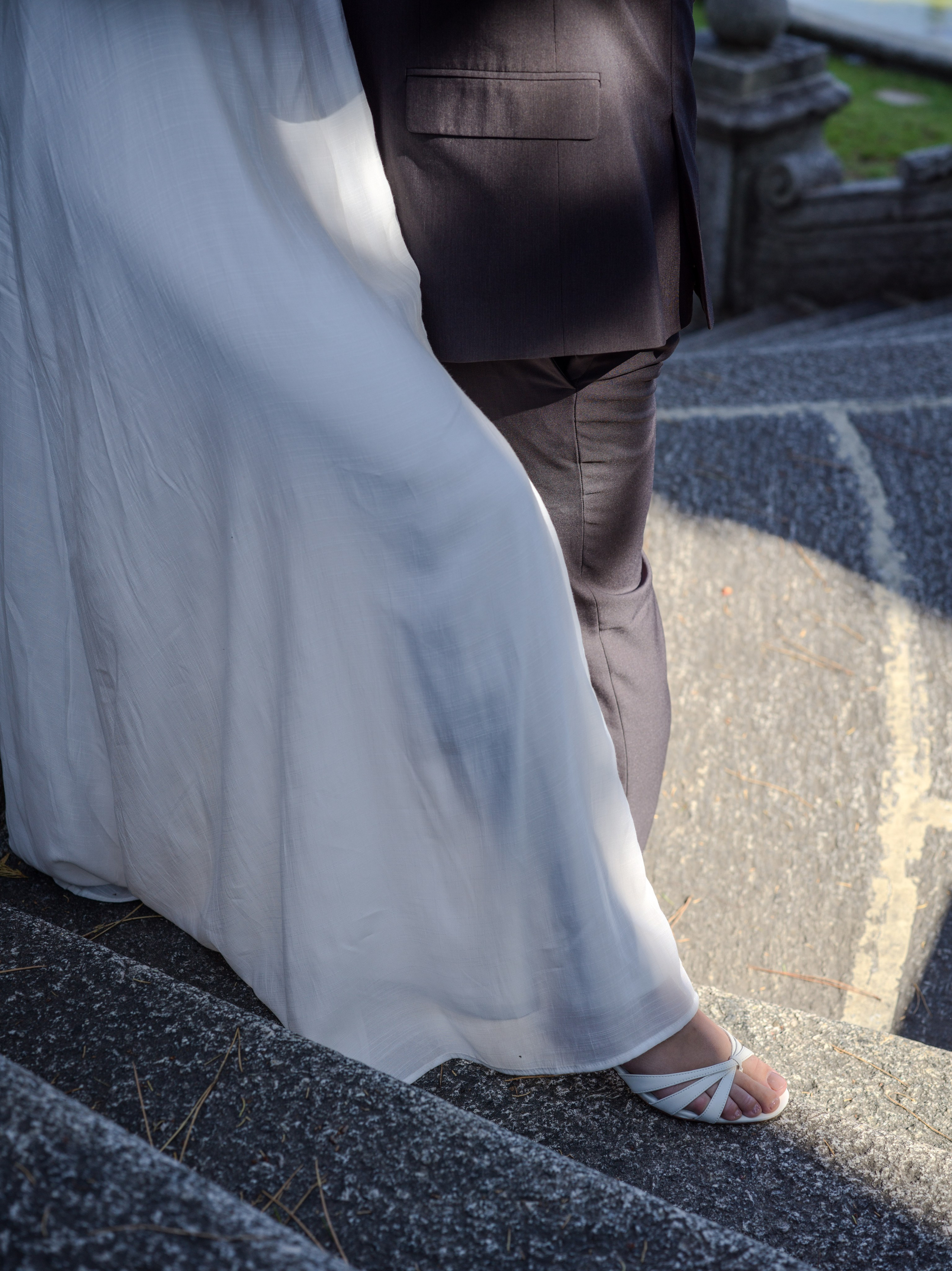 Couple's first look in Tremezzo's lakeside park, luxury Lake Como elopement photography by Ale Kor