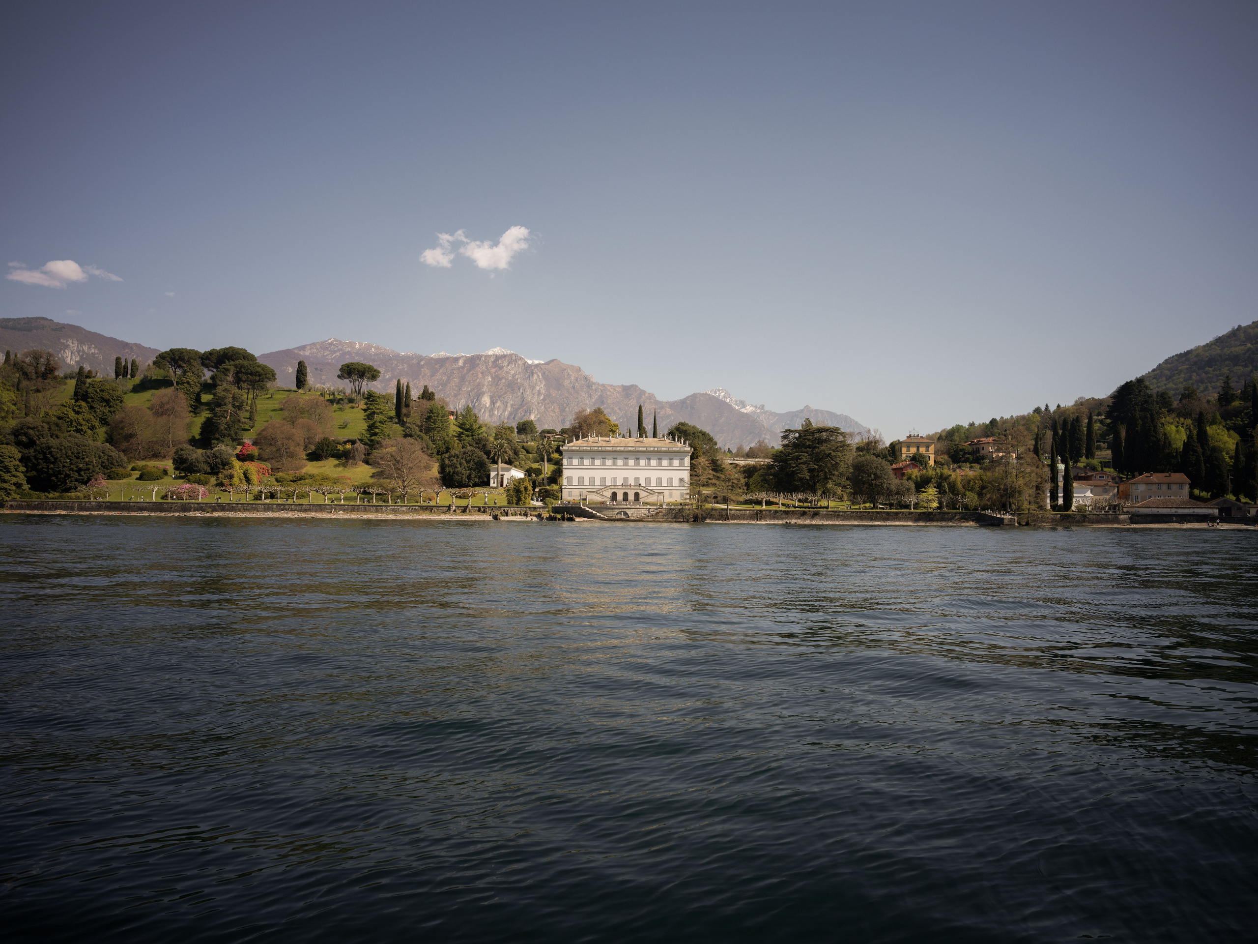 Villa Melzi proposal photography featuring a couple in the historic gardens overlooking Lake Como
