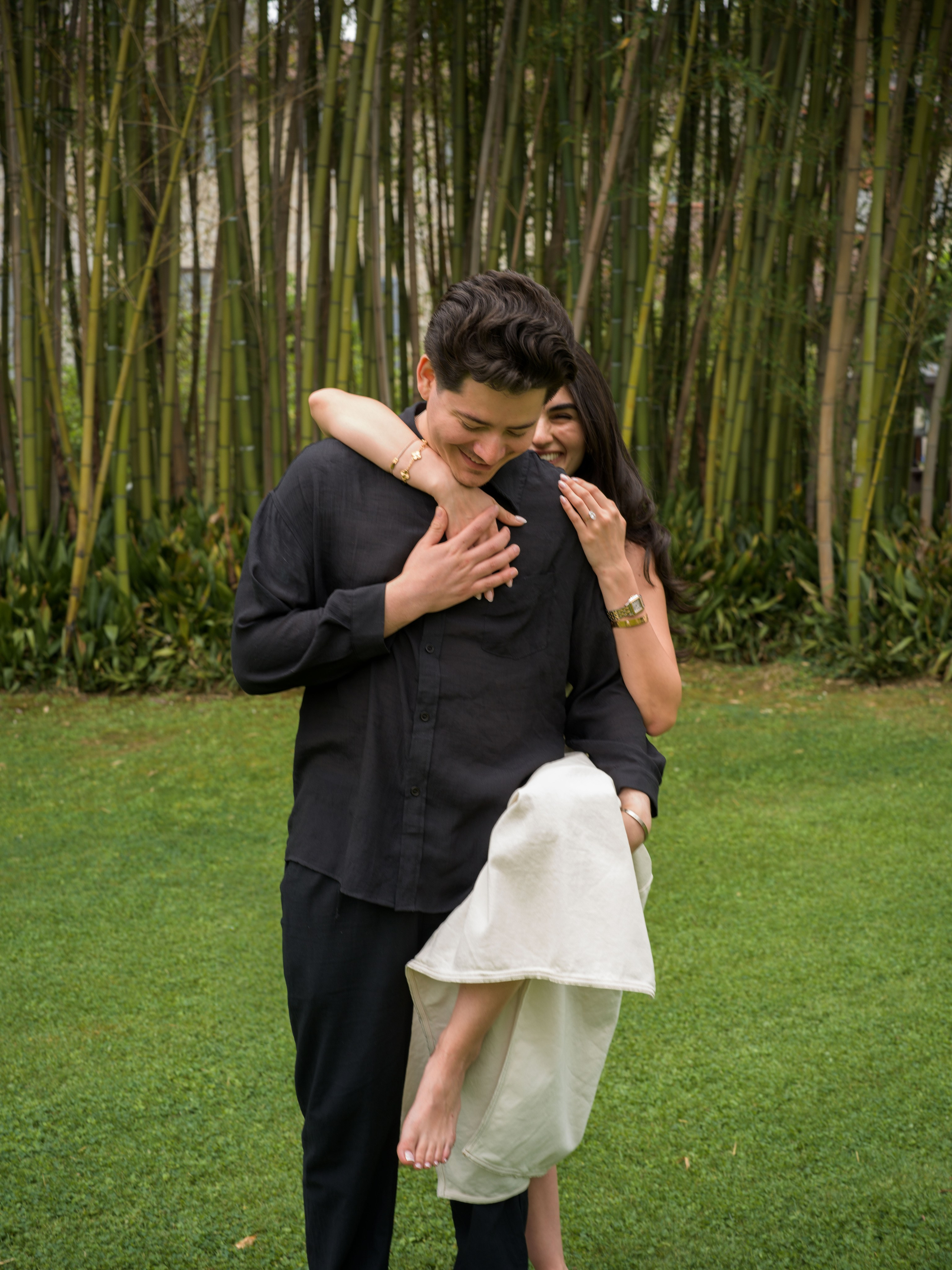 Romantic Lake Como proposal at Villa Melzi with a couple exploring the historic gardens and lakeside landscape