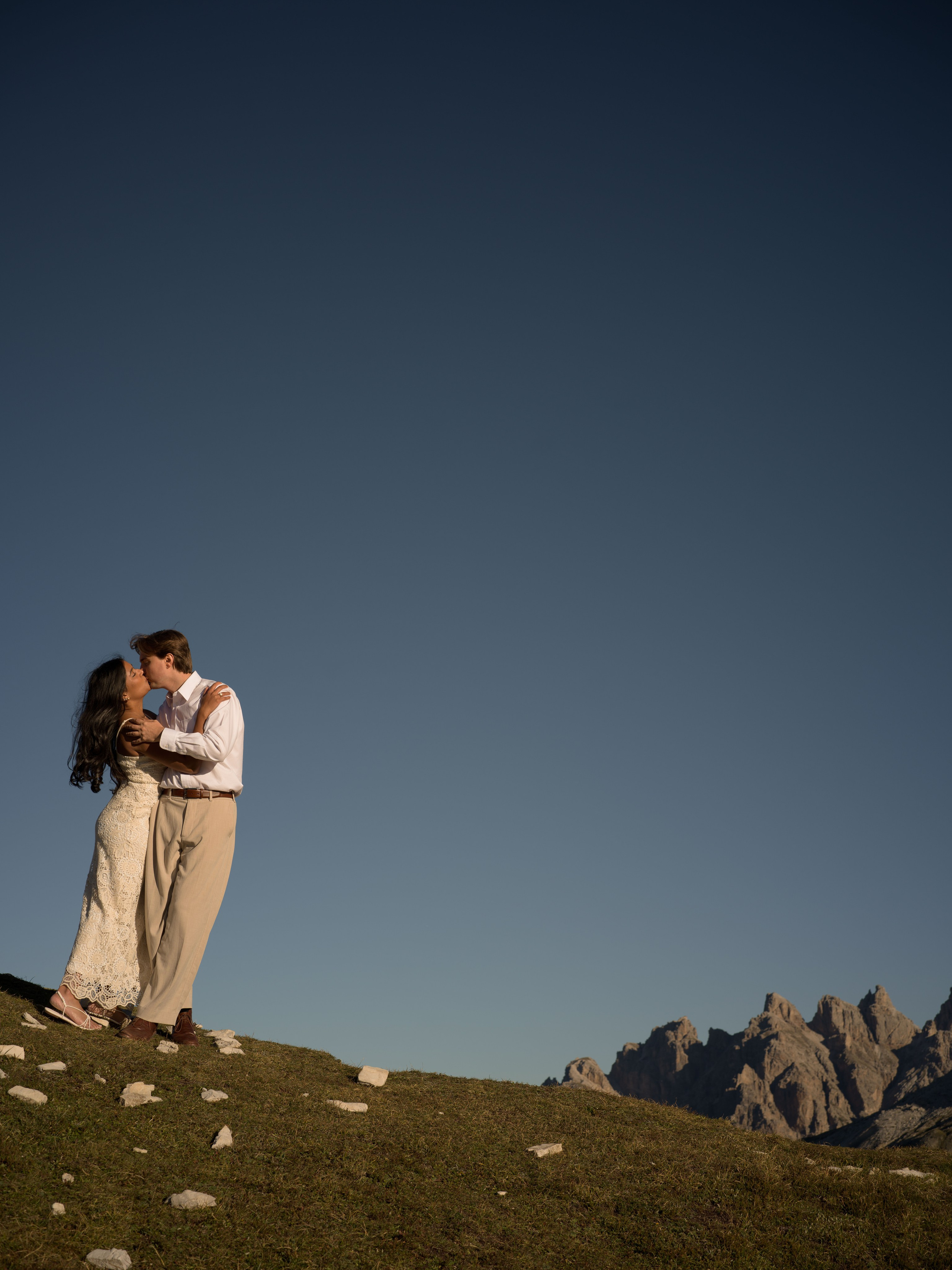Romantic proposal at Cadini Group near Misurina in the Dolomites, photographed during sunrise with Tre Cime di Lavaredo in the background.