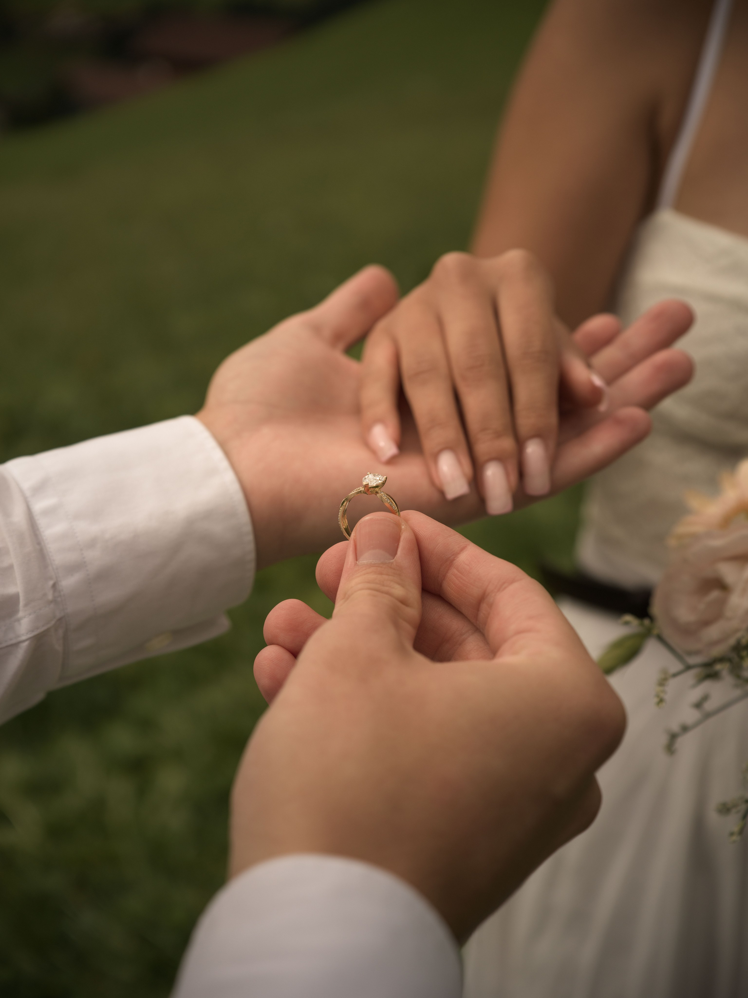 Marriage proposal photography in Val di Funes, Italy, capturing an emotional engagement moment in Santa Maddalena beneath the famous Odle mountain range.