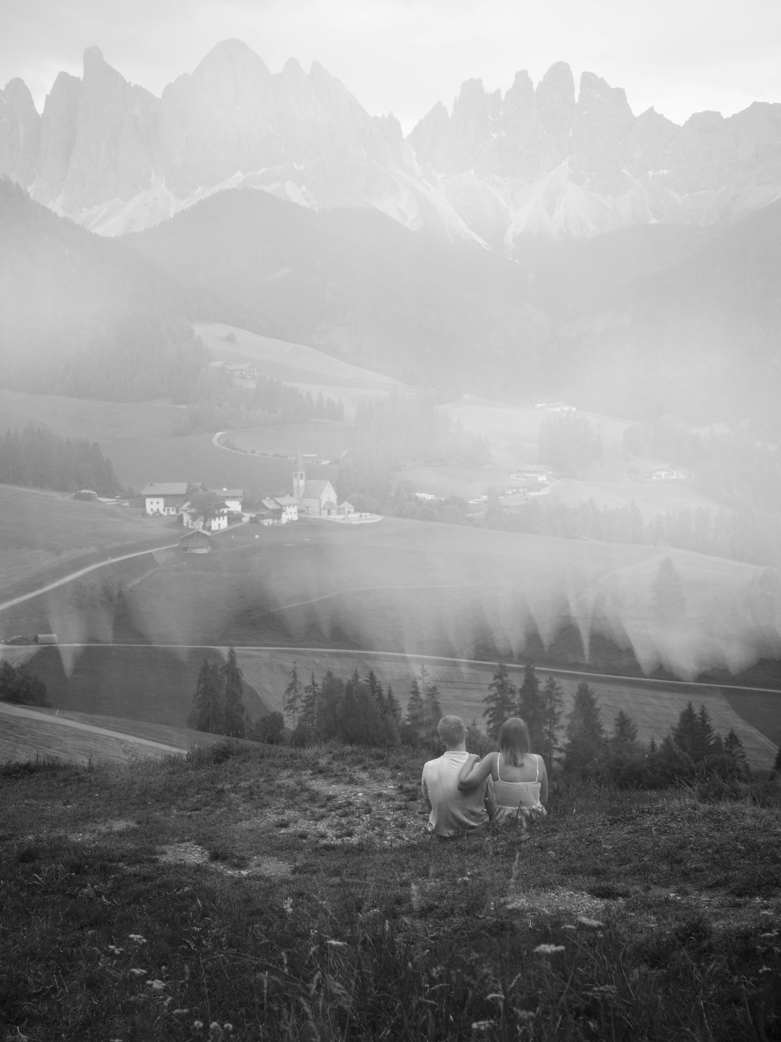 Santa Maddalena proposal at sunset in the Dolomites, Italy, captured in a cinematic fine art photography style with dramatic mountain scenery
