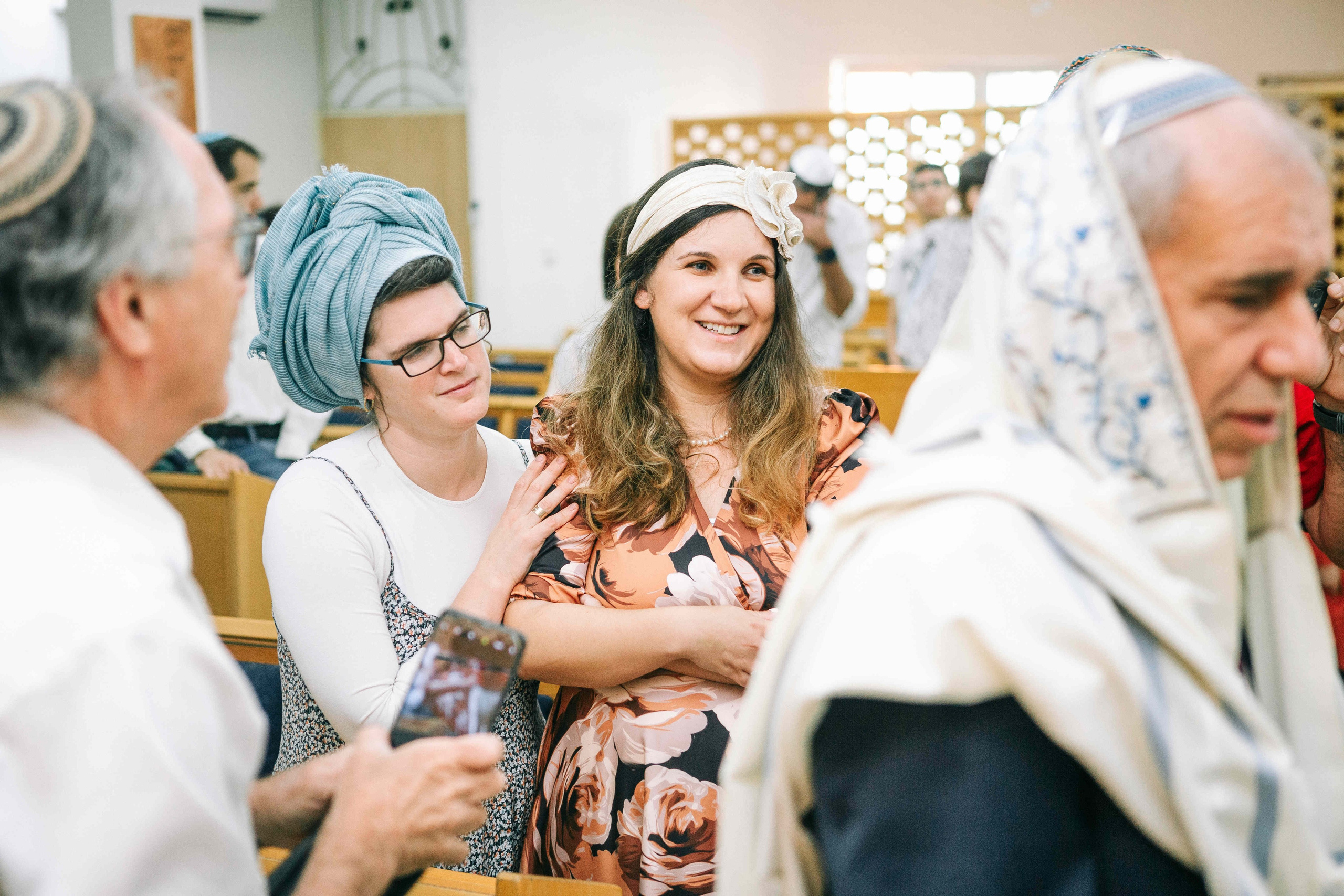 BRITH MILA IN THE SMALL SYNAGOGUE. PHOTOGRAPHER IN ISRAEL