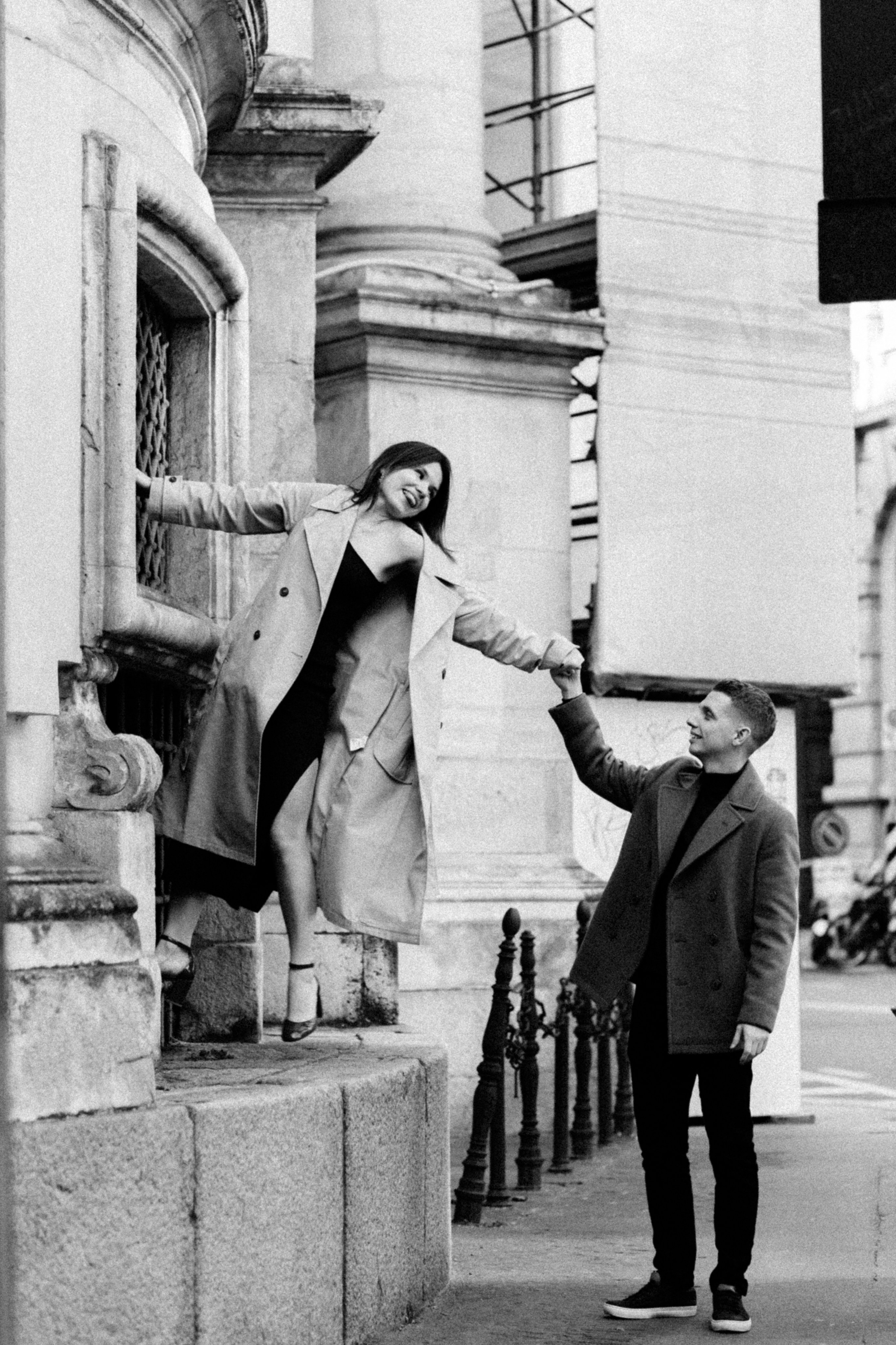 Aleksandr holding Daria’s hand while walking through Milan