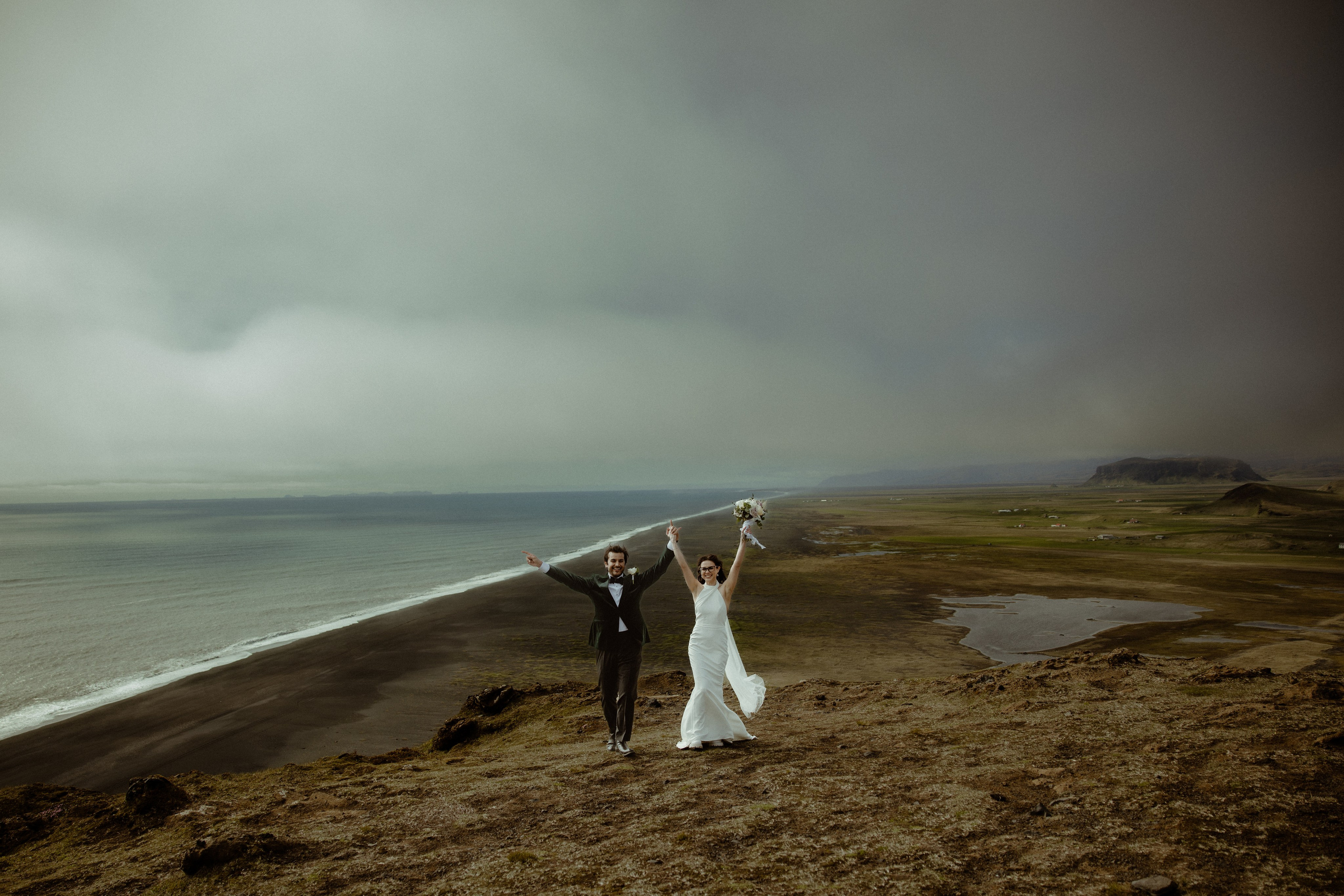 Iceland elopement at endless black sand beach. Iceland elopement photographer & videographer