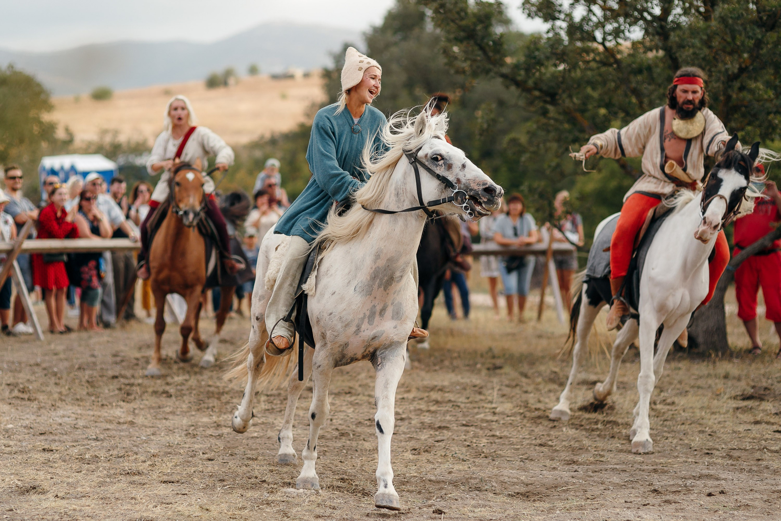 Horse riders in historical costumes