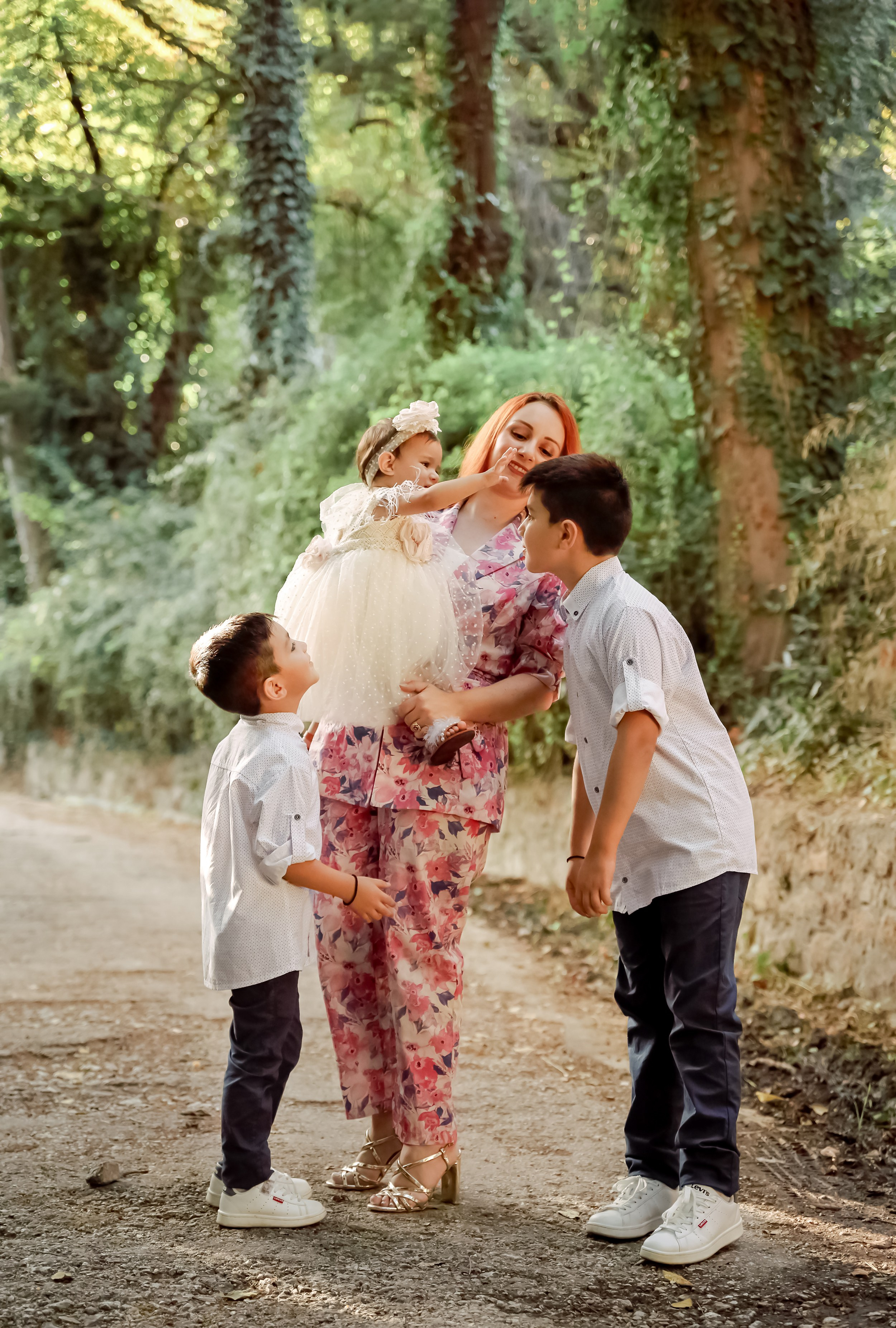 A happy family is enjoying its time in a park. Greece, Rhodes island