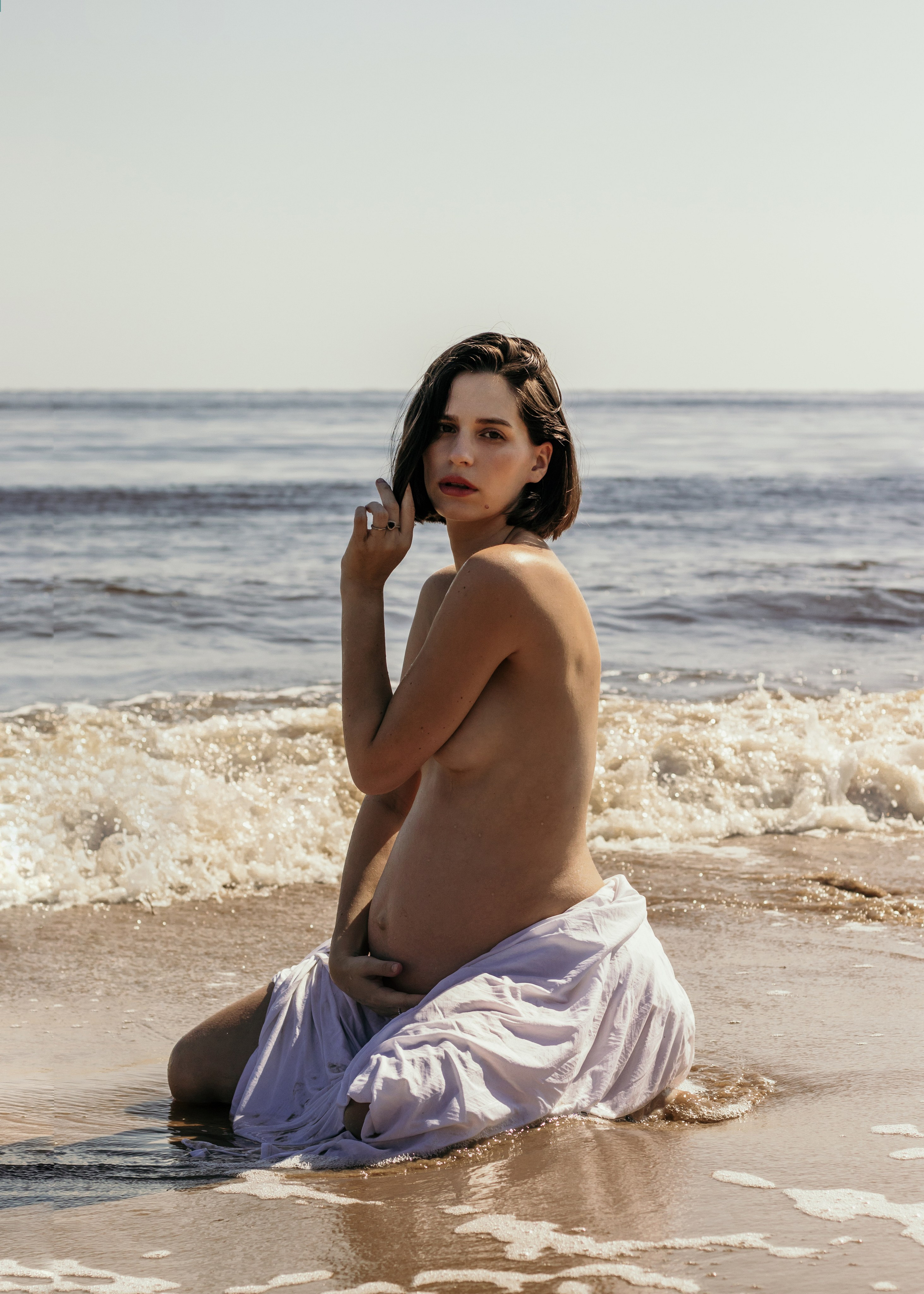 Maternity photoshoot at the beach. Portrait and couples photographer in Florida, Valeriia Honcharova
