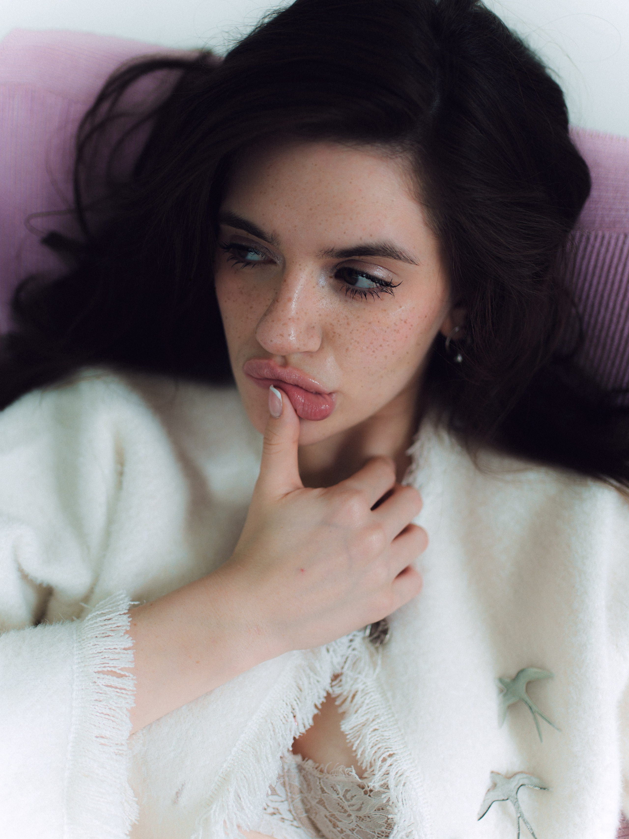 Close-up portrait with natural makeup and soft shadows