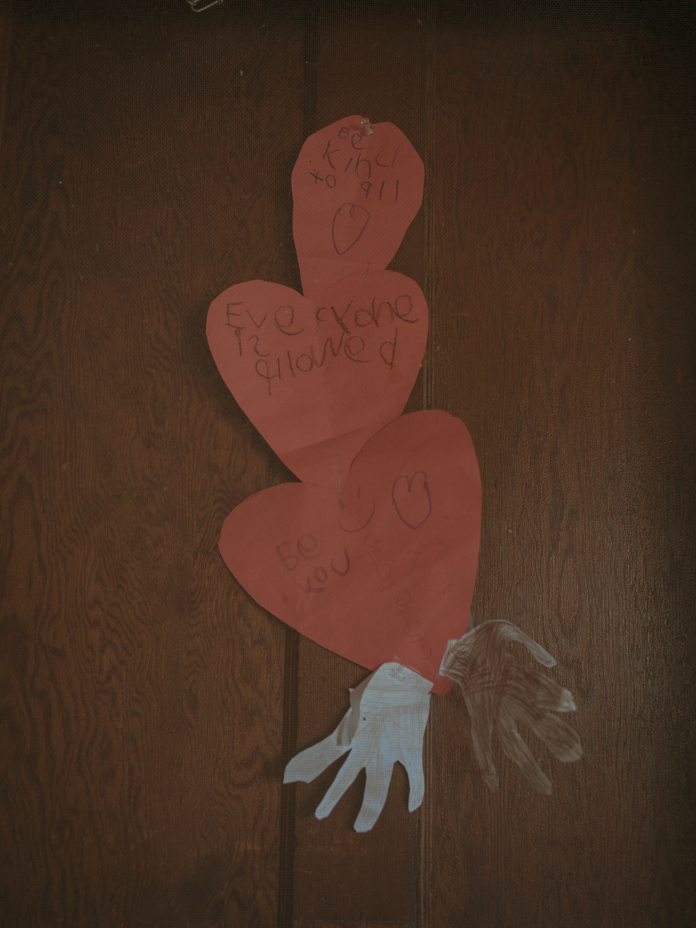 A little collage that Simone made is hanging on the door.