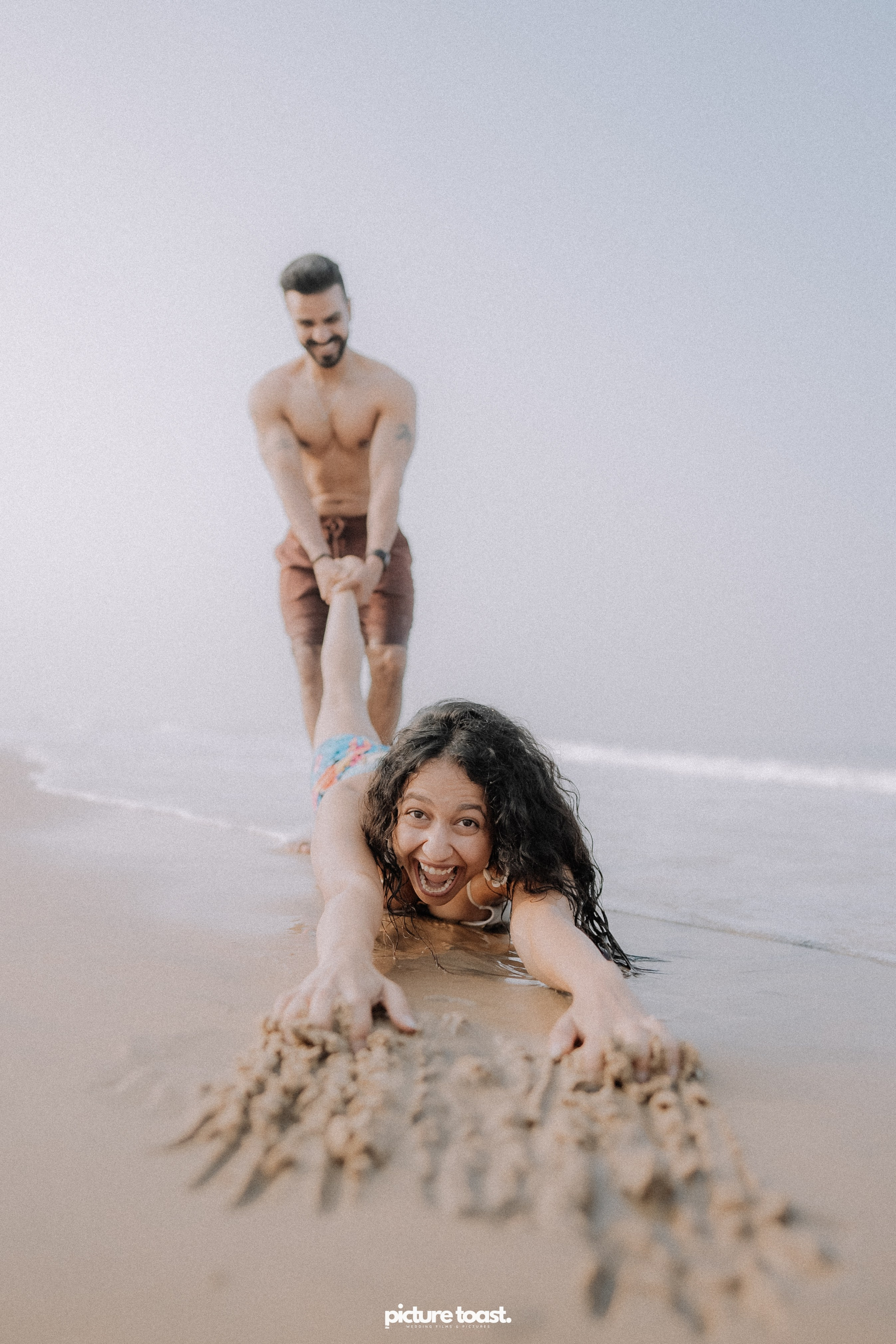 Love In The Beach. Fine art Wedding Photographers in India & Canada