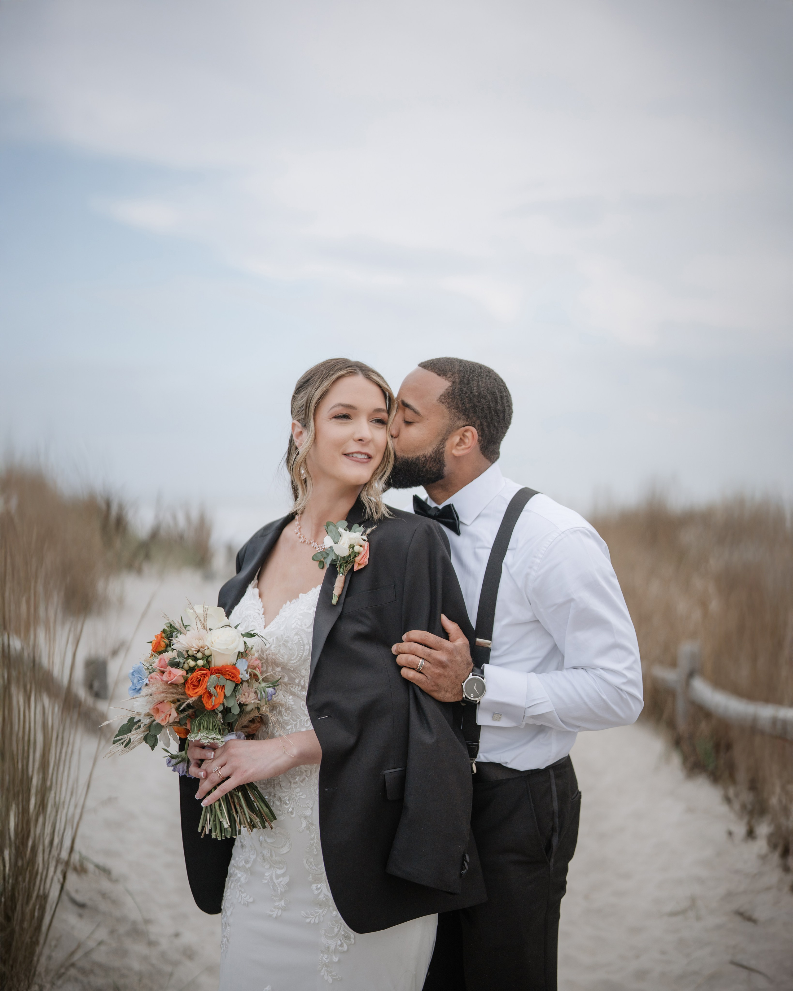 Wedding walk on the beach. Portrait and wedding photographer in New York