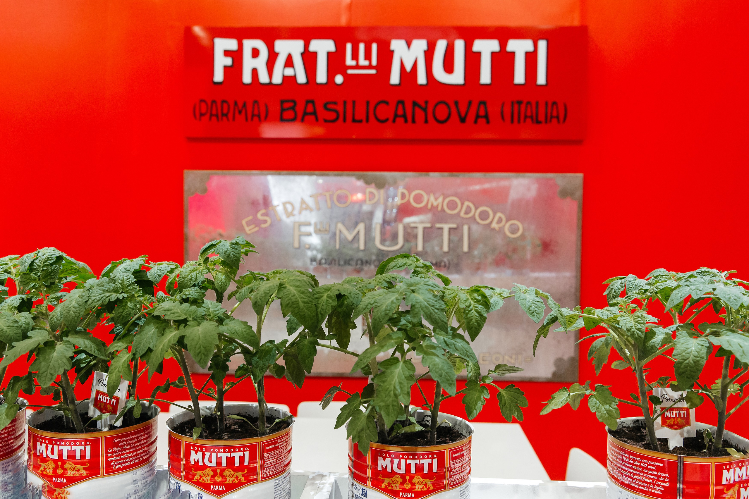 Stand dell'azienda Mutti alla fiera Cibus 2024 a Parma, Area interattiva dell'azienda Mutti alla fiera Cibus 2024