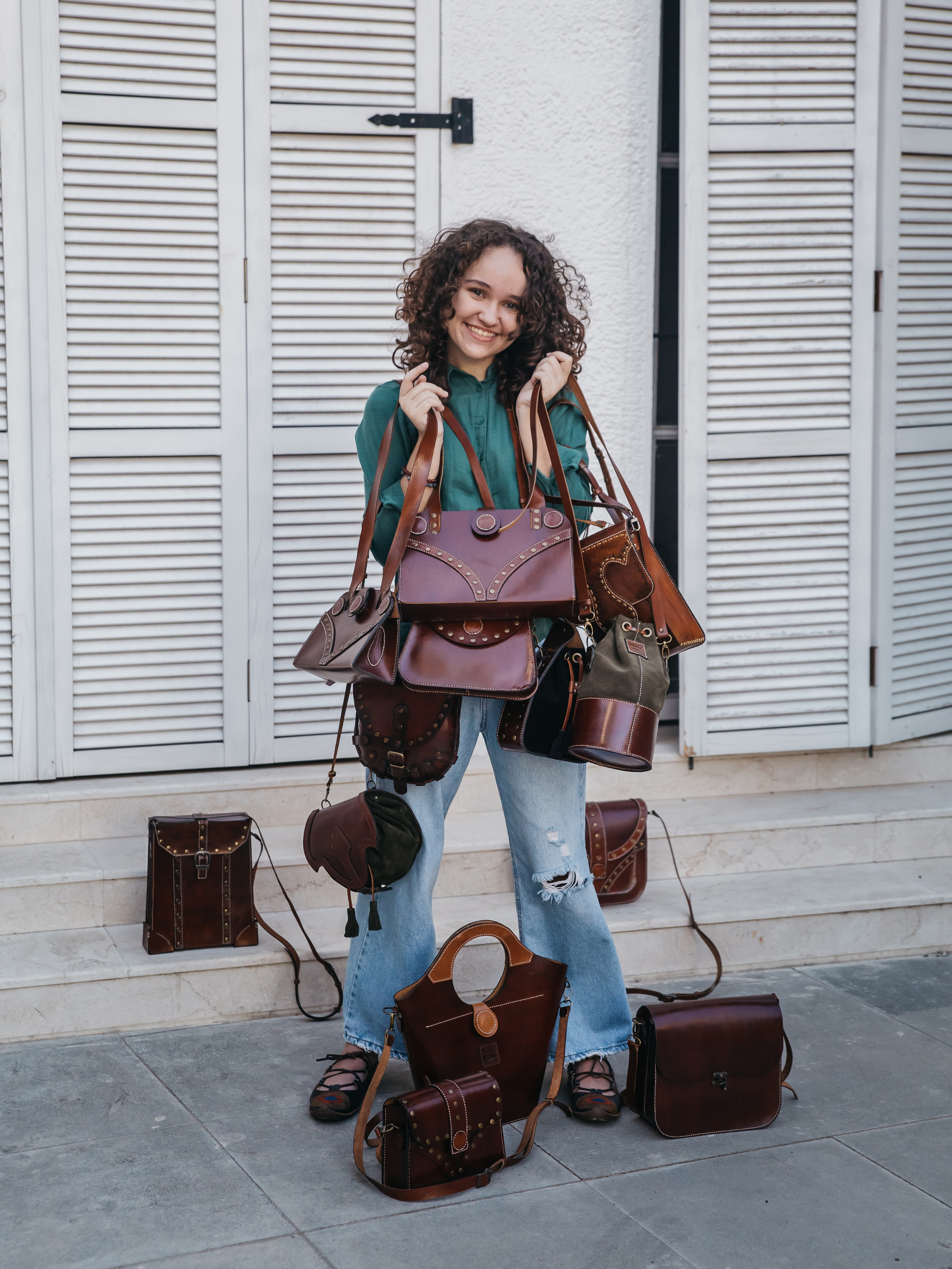 photography of handmade leather bags