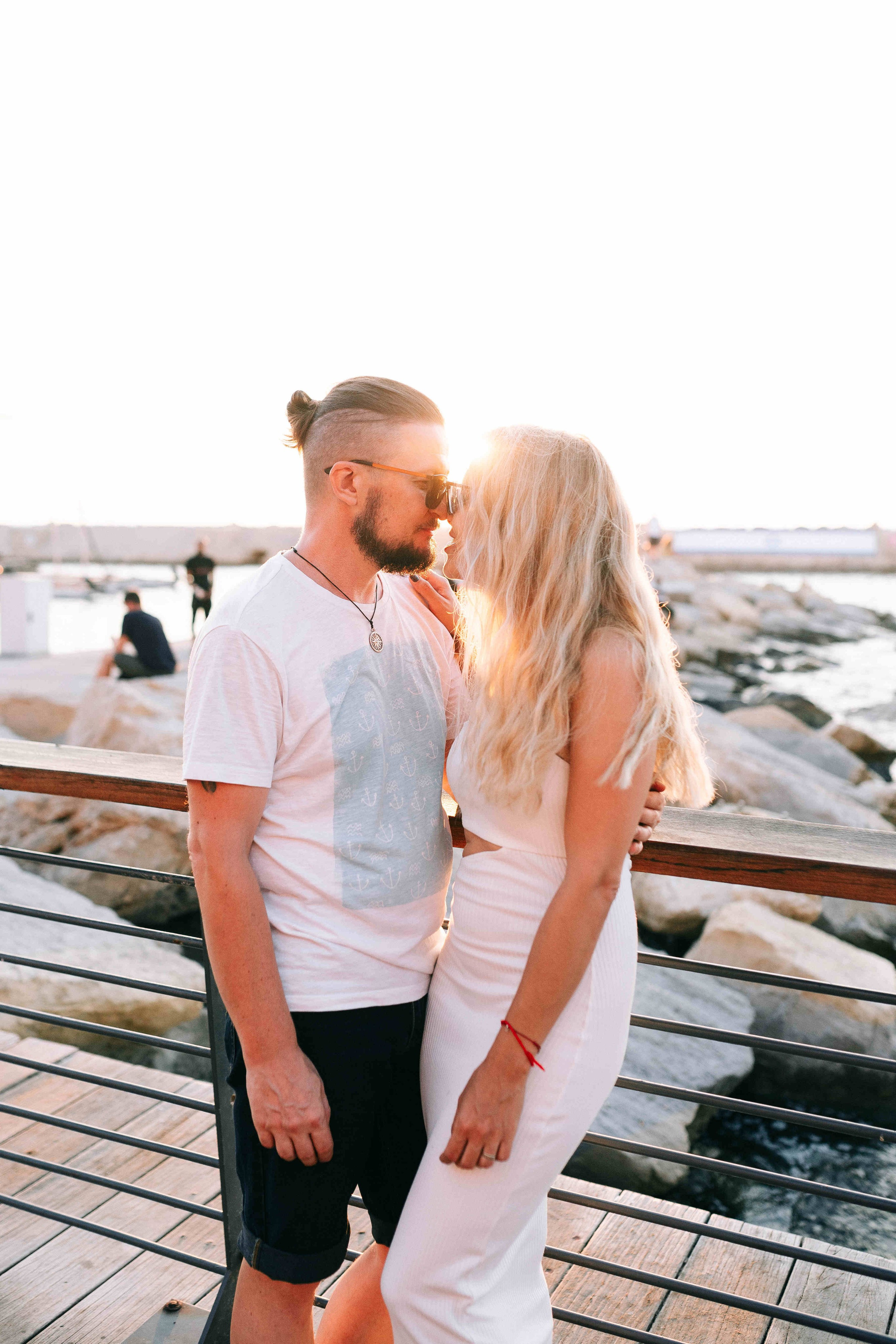 SUNSET IN JAFFO PORT. PHOTOGRAPHER IN ISRAEL