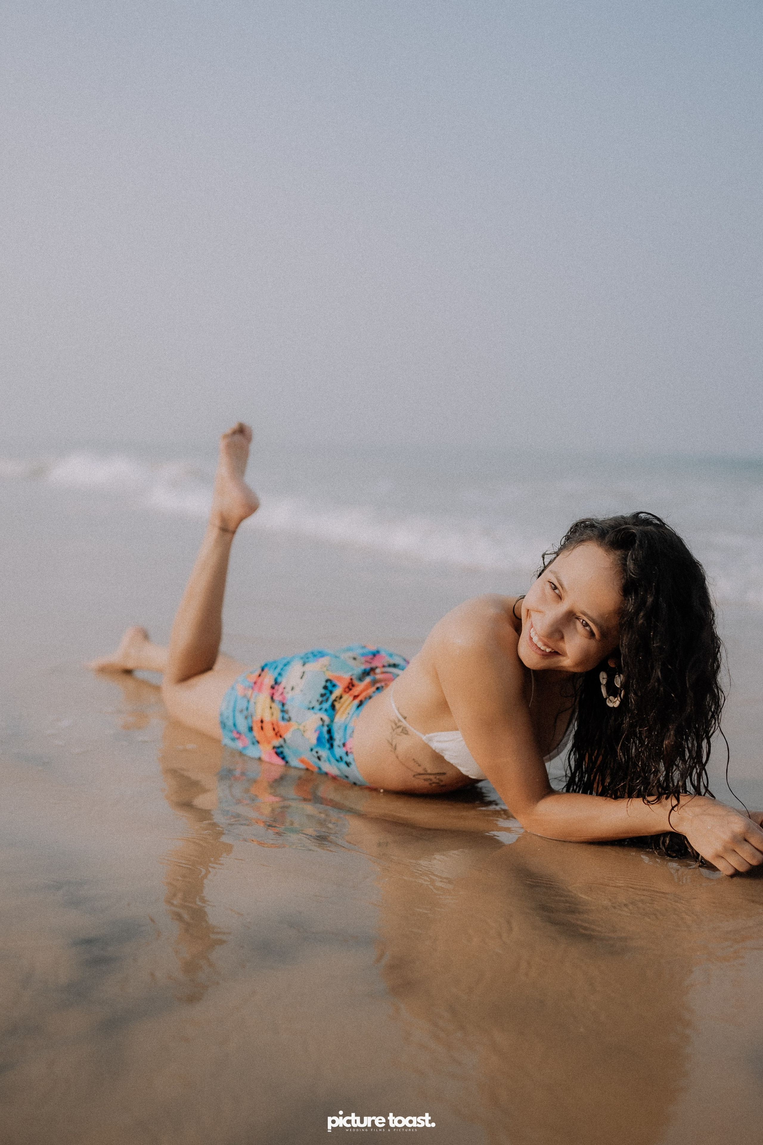 Love In The Beach. Fine art Wedding Photographers in India & Canada