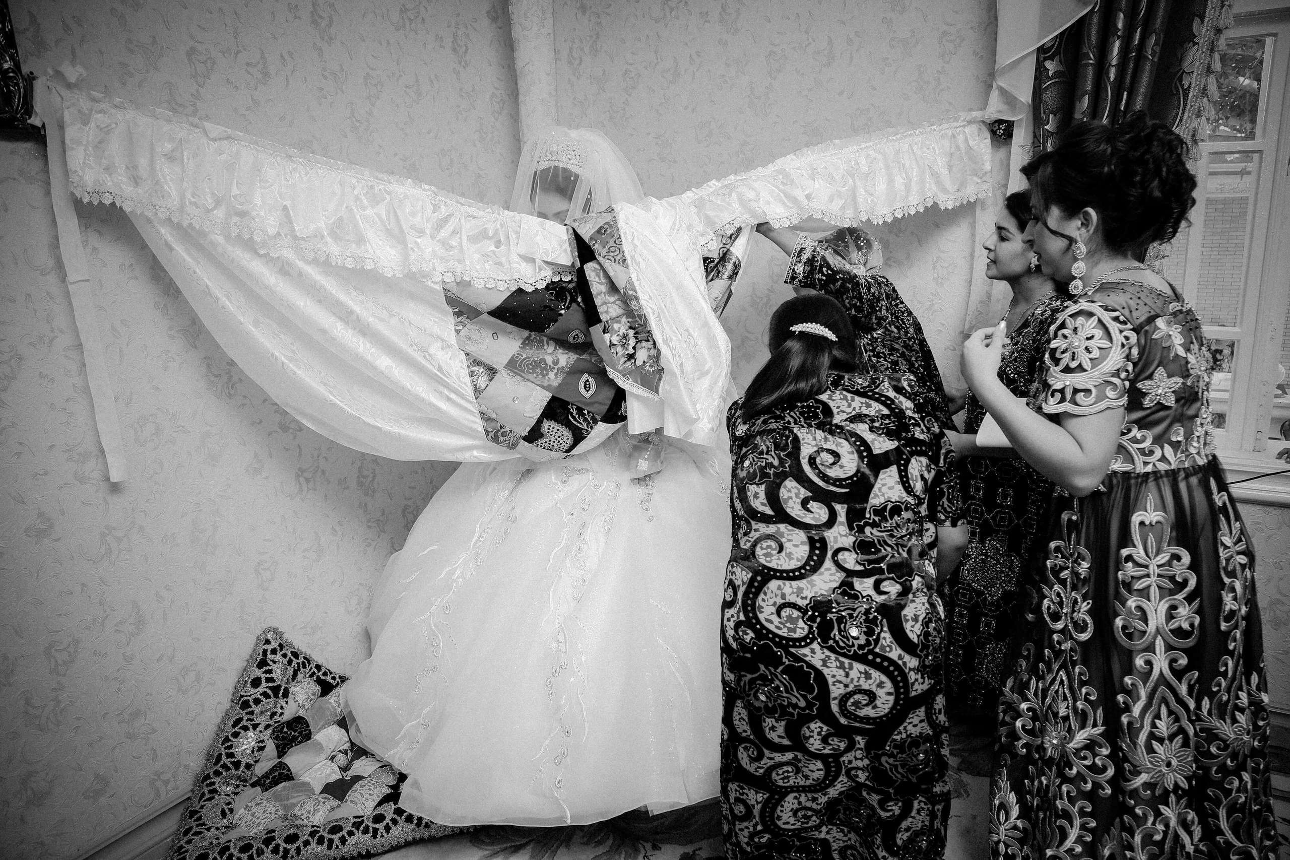 Tajik wedding, portrait of Asian bride, wedding dress. Wedding and family photographer in Cork, Ireland. Tigran