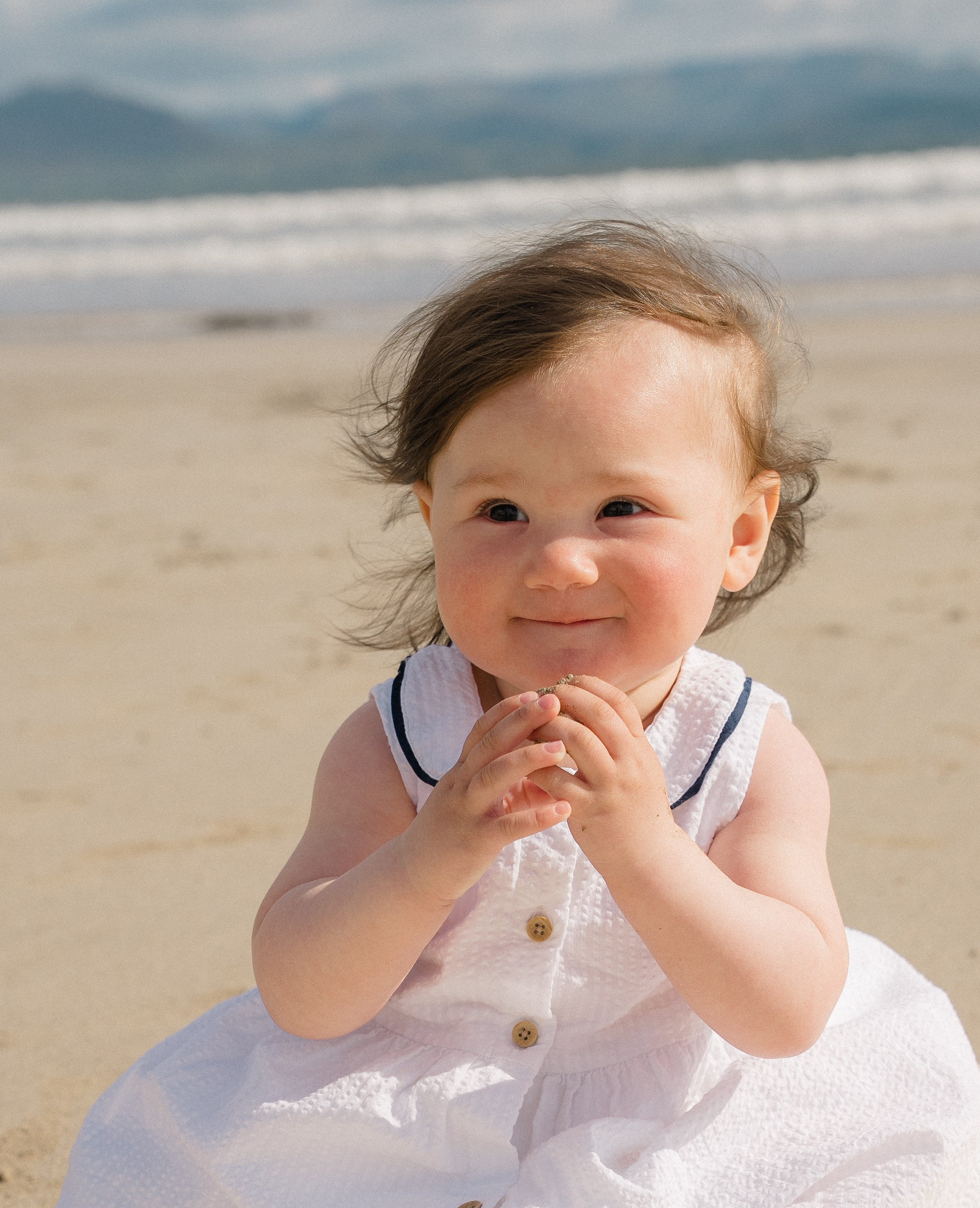 Darya and Mia at the ocean. Wedding and family photographer Ireland