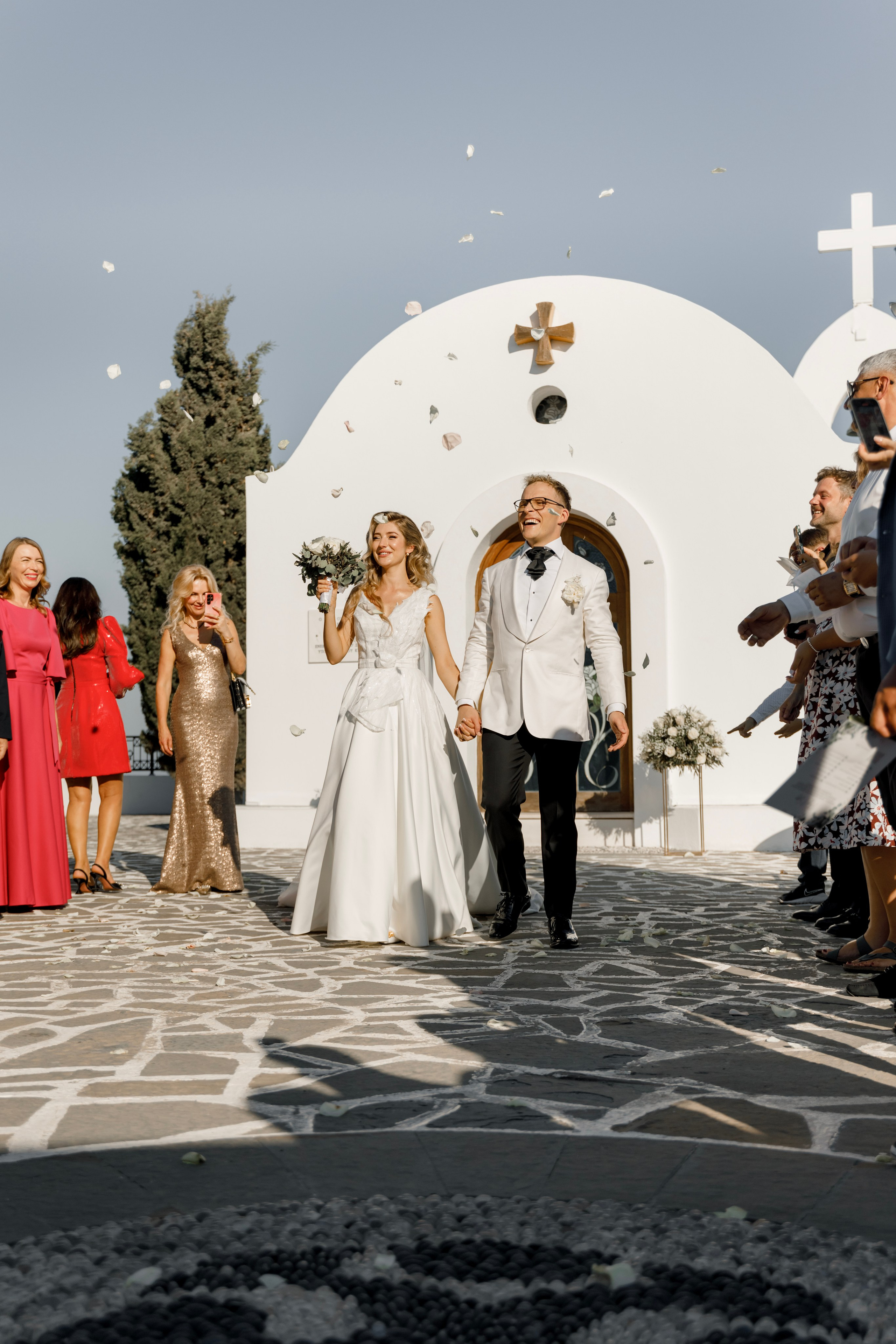 Groom and bride are happy after the ceremony in Church Agia Sofia in luxury hotel Esperos Village. Rhodes Greece